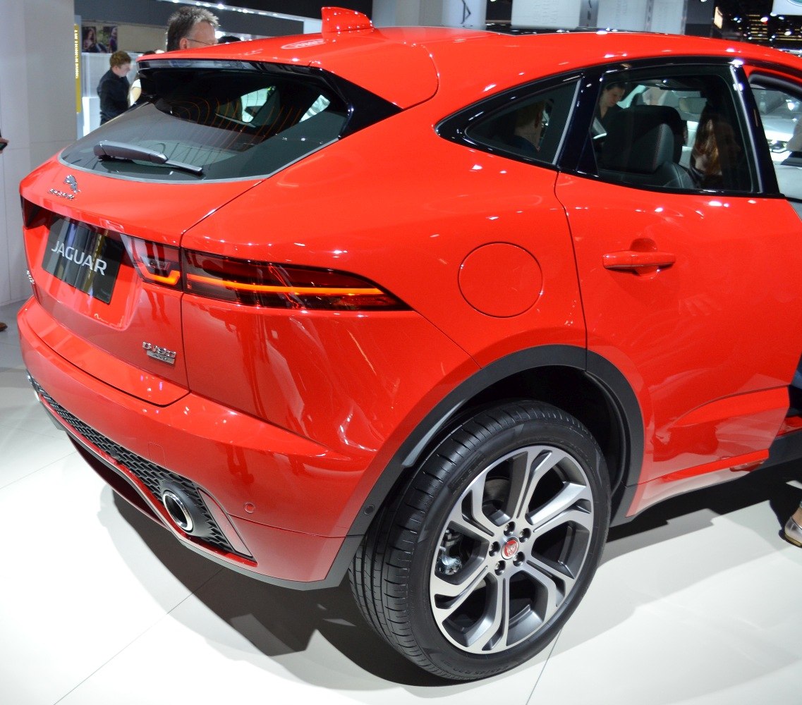 Rear view with taillights, alloy wheels, and rear bumper exhaust detail