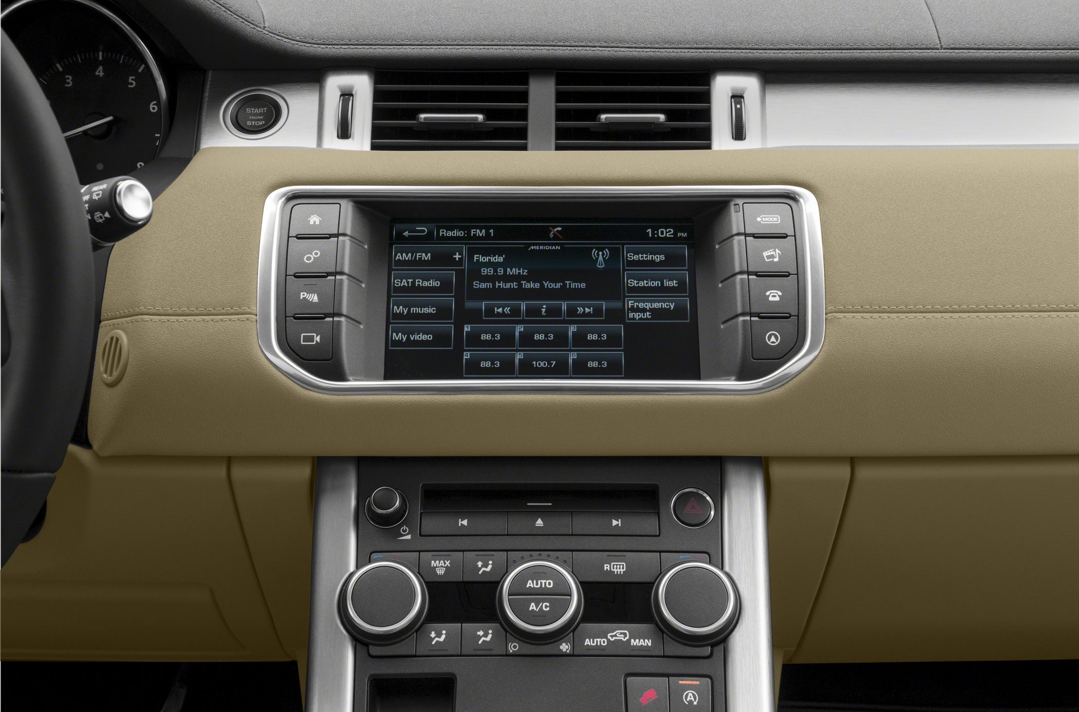 Infotainment system and climate control panel in luxury SUV interior