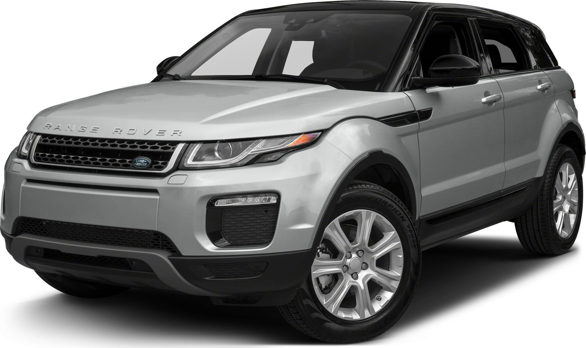 Front grille, headlights, alloy wheels, silver SUV with black roof