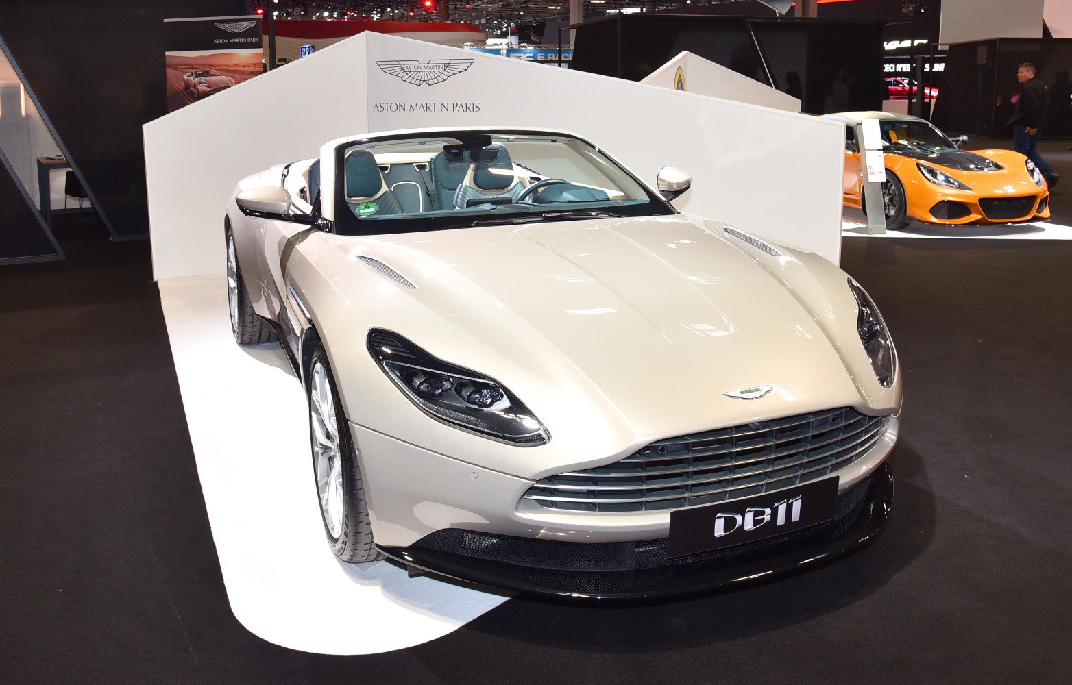 Convertible luxury sports car with distinctive grille and sleek headlights