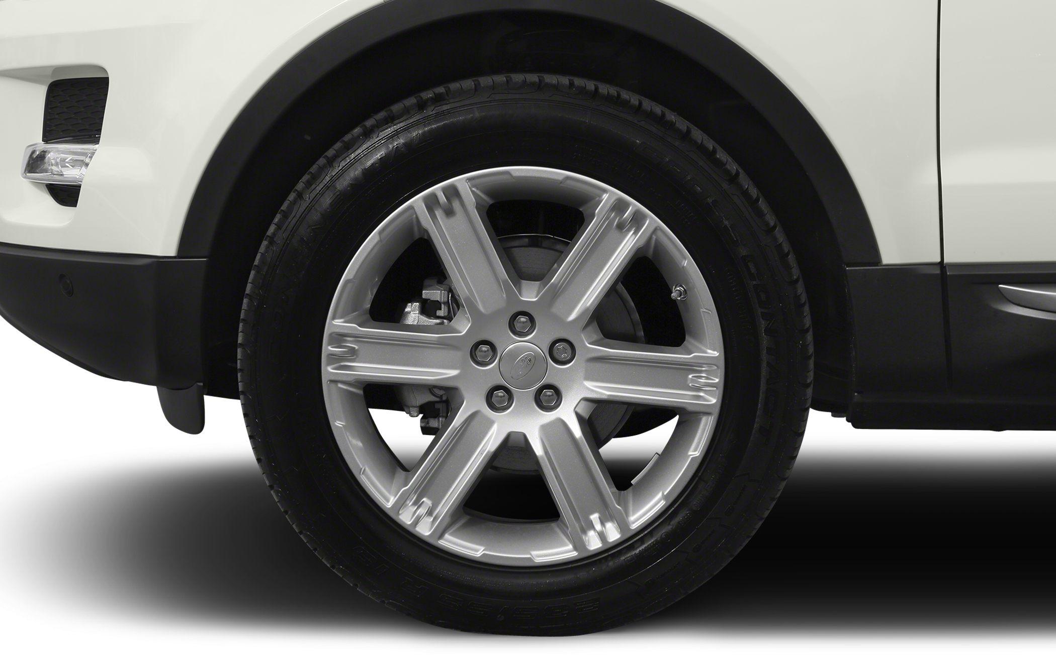 Silver alloy wheel with tire and brake disc