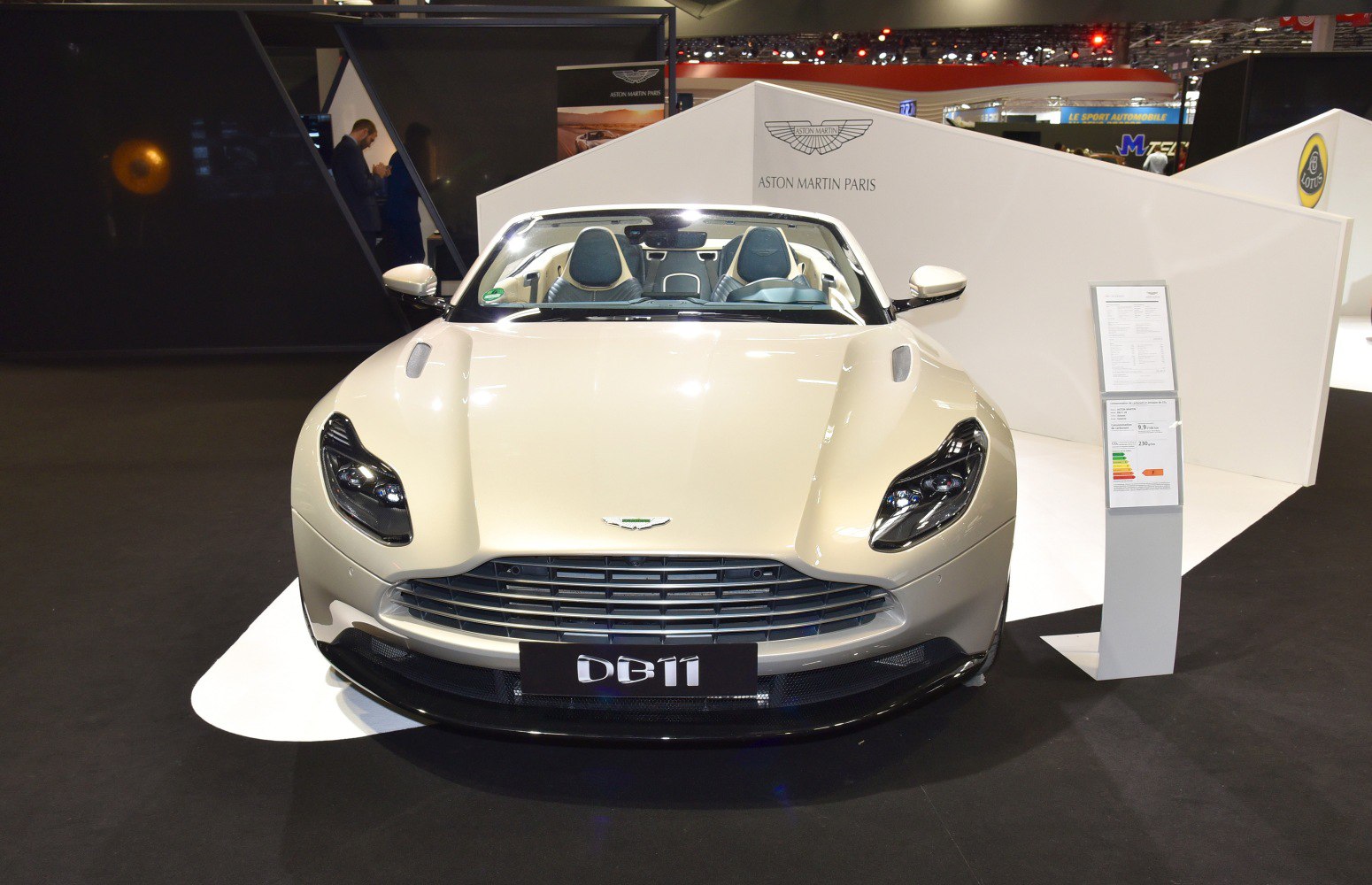 Convertible sports car front with distinctive headlights and grille