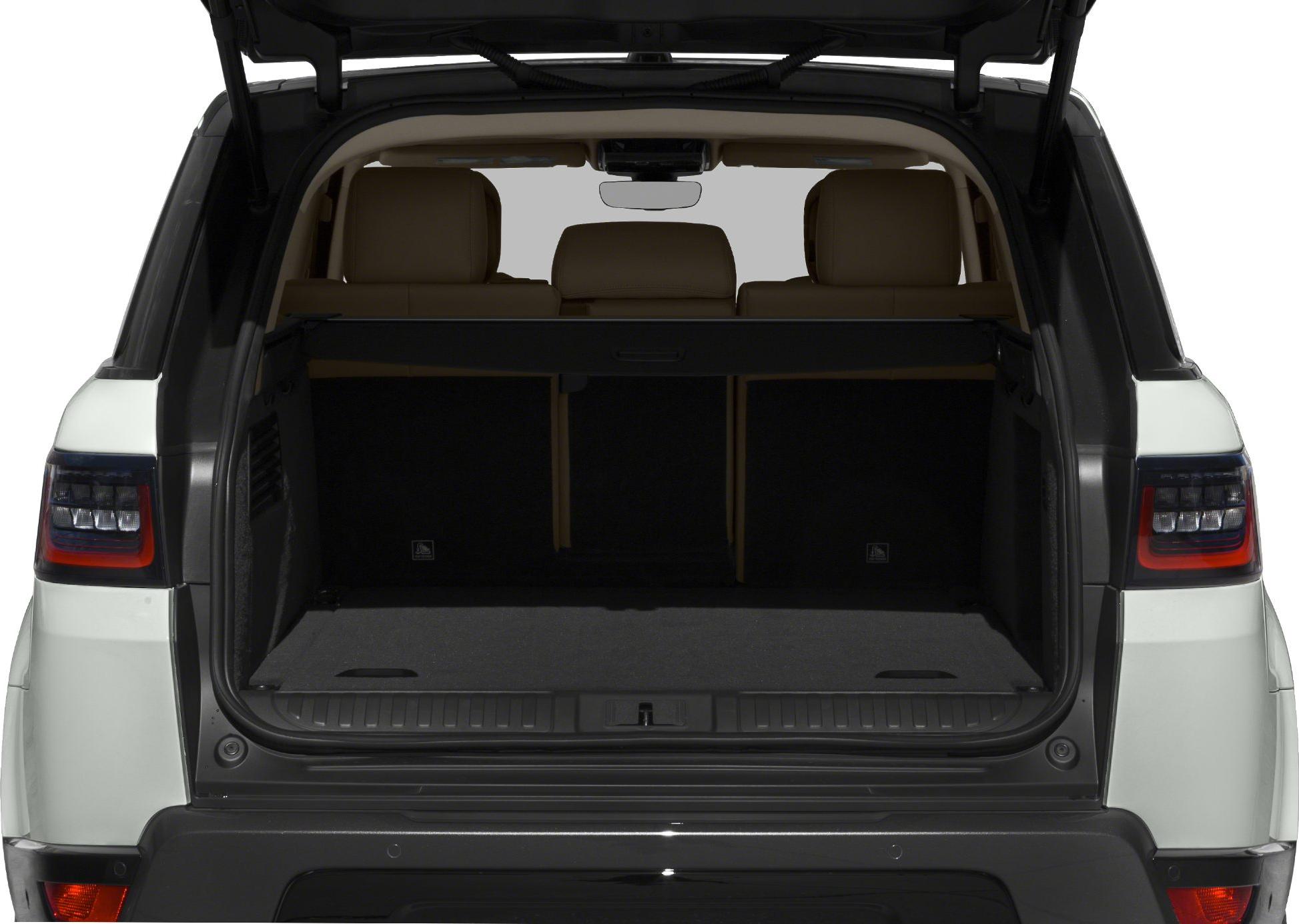 Open rear hatchback showing spacious cargo area with beige seats.