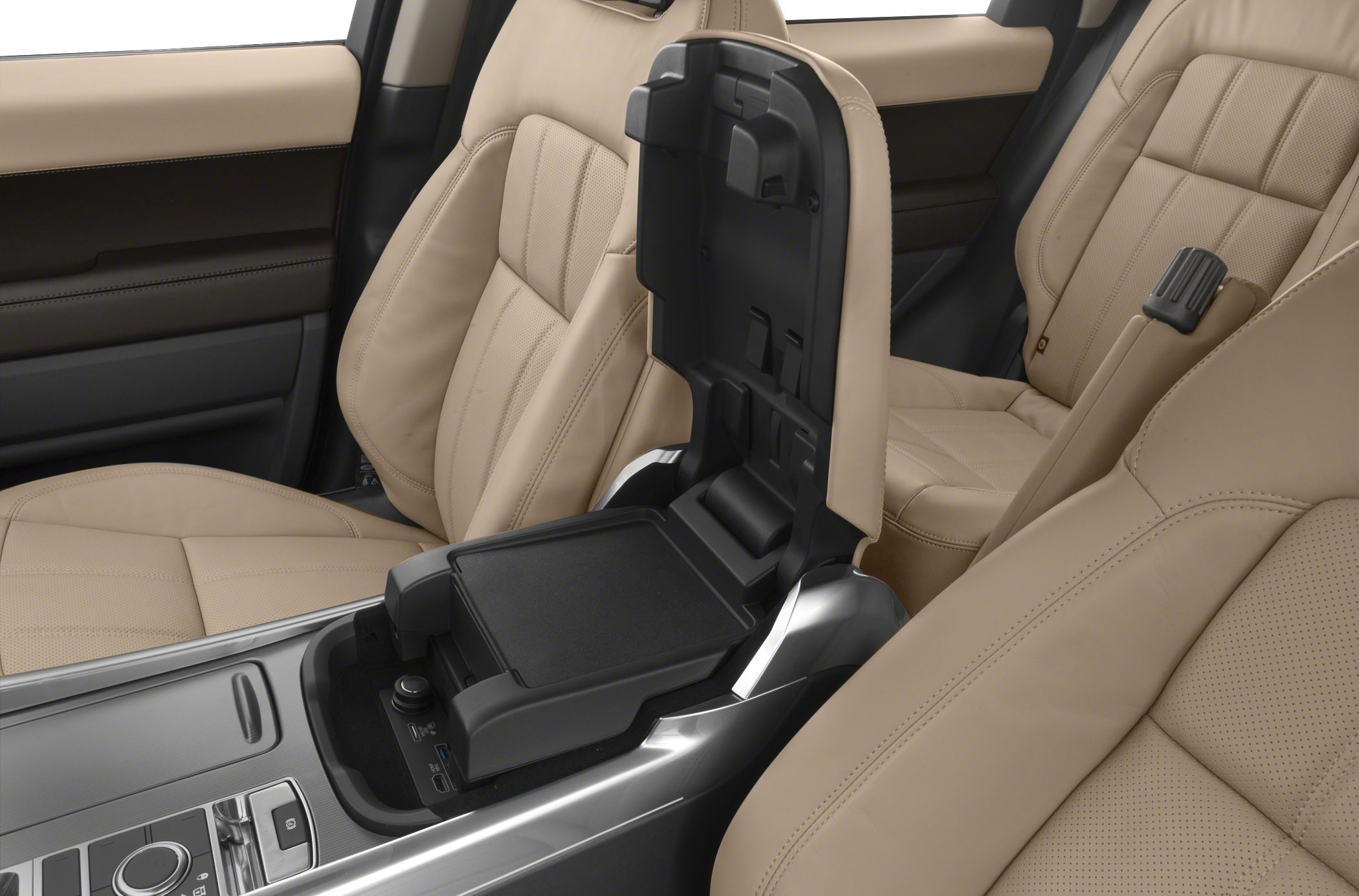 Beige leather seats and open center console with storage compartment
