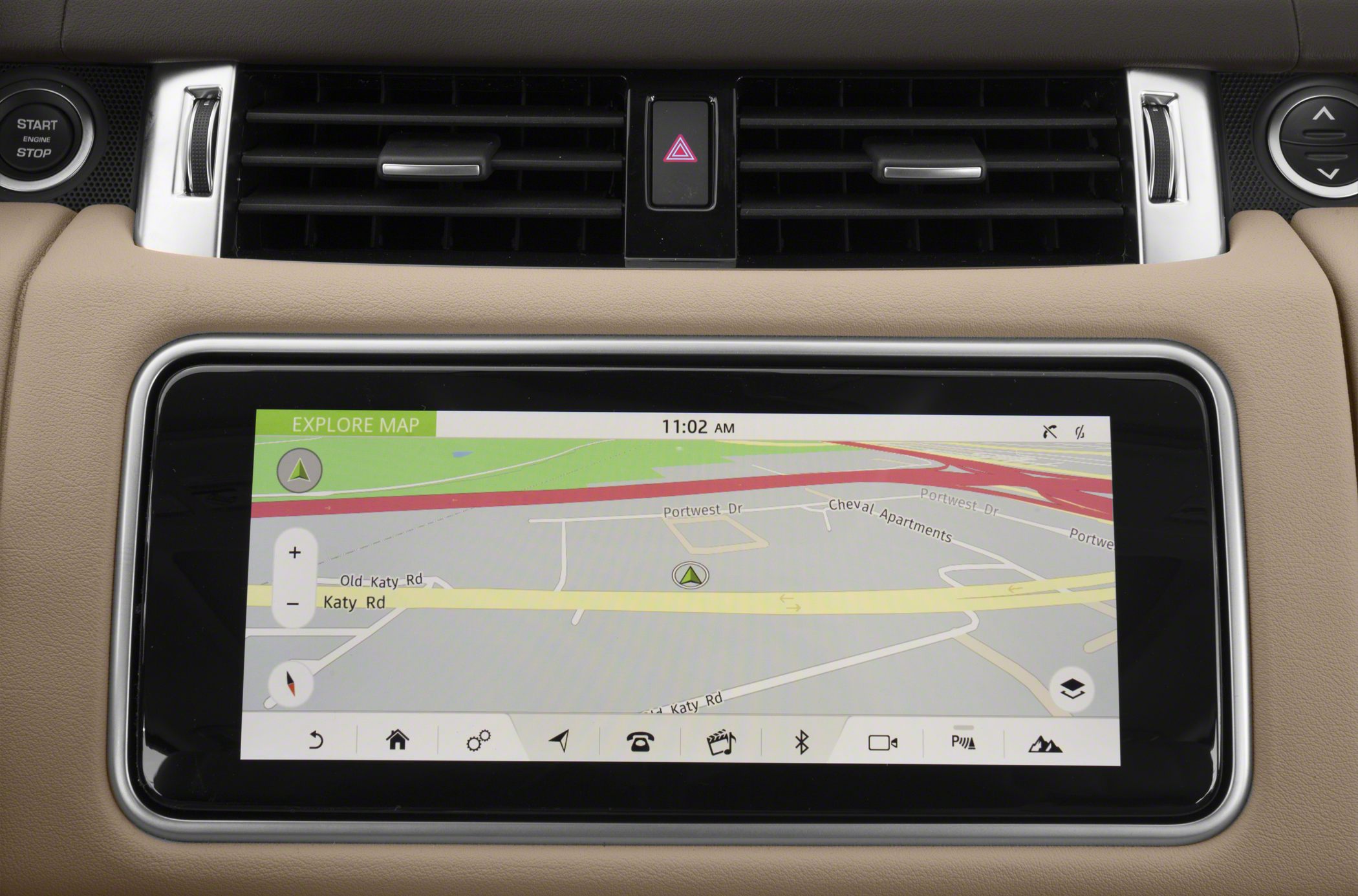 Touchscreen navigation display and dashboard controls in beige interior