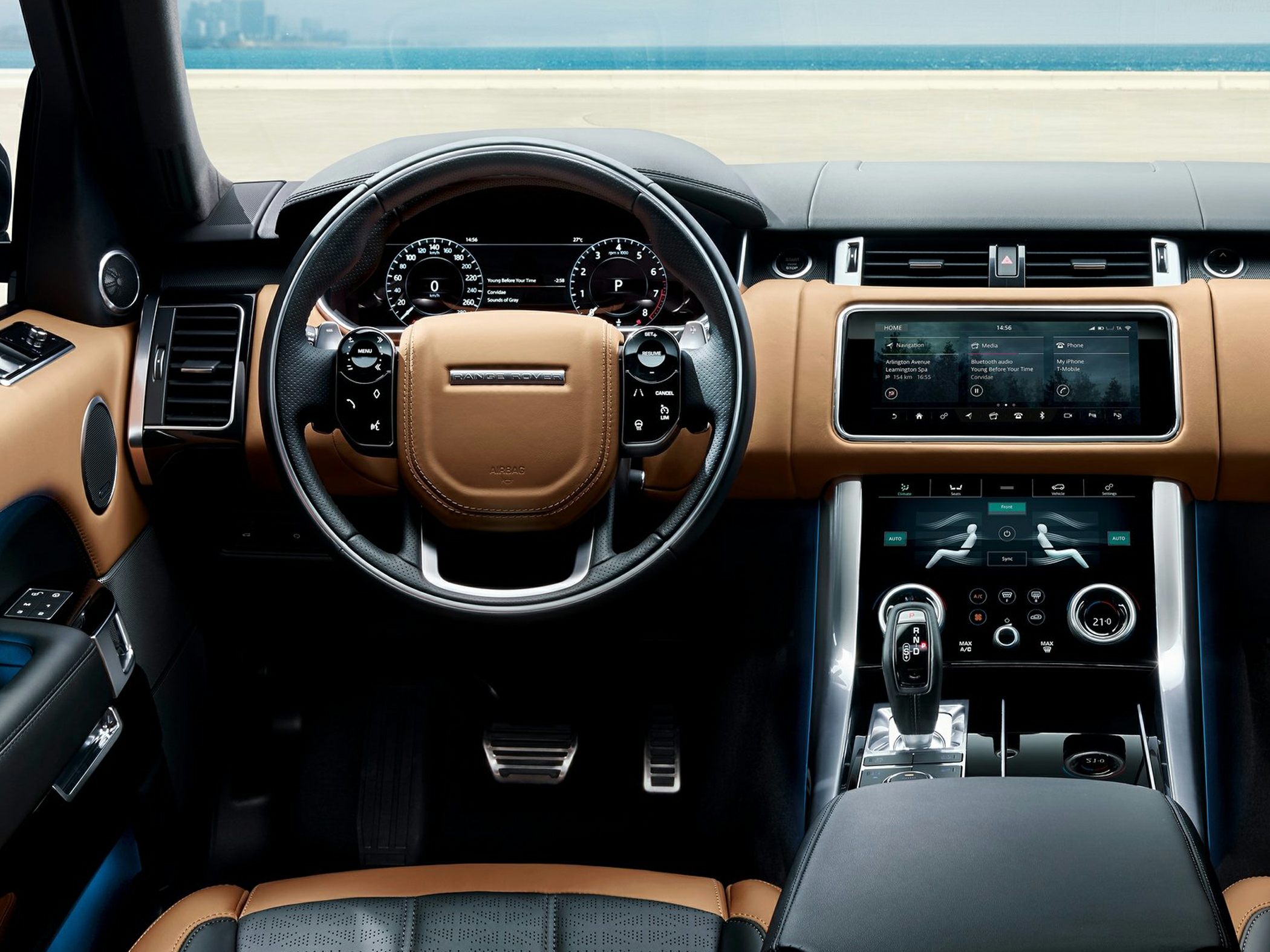 Digital instrument cluster and dual touchscreen center console interior