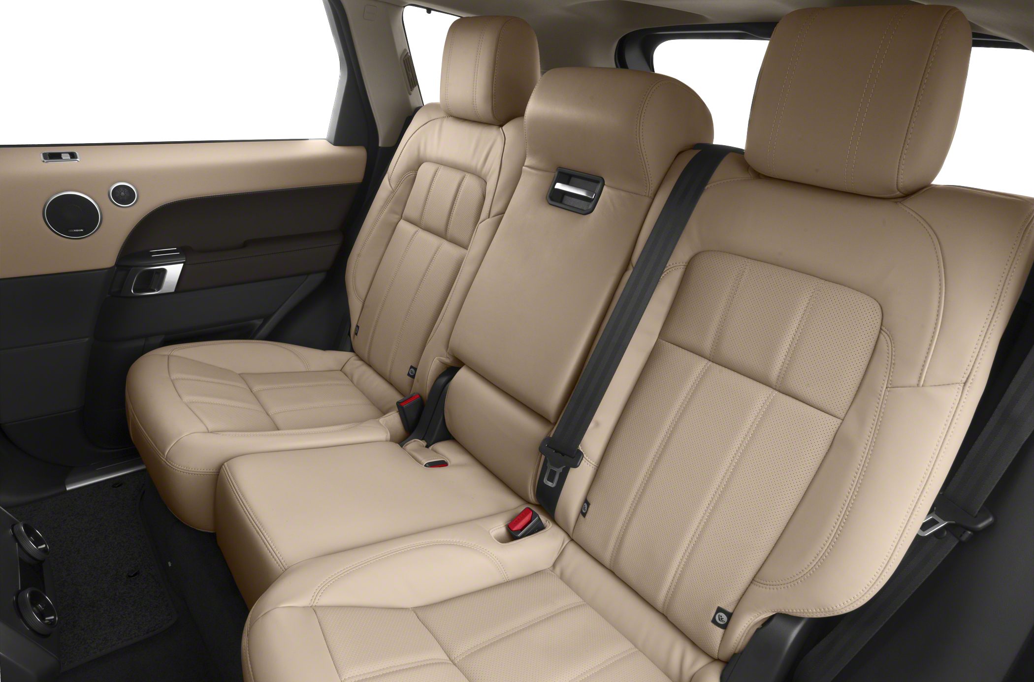 Beige leather rear seats with detailed stitching and seat belts