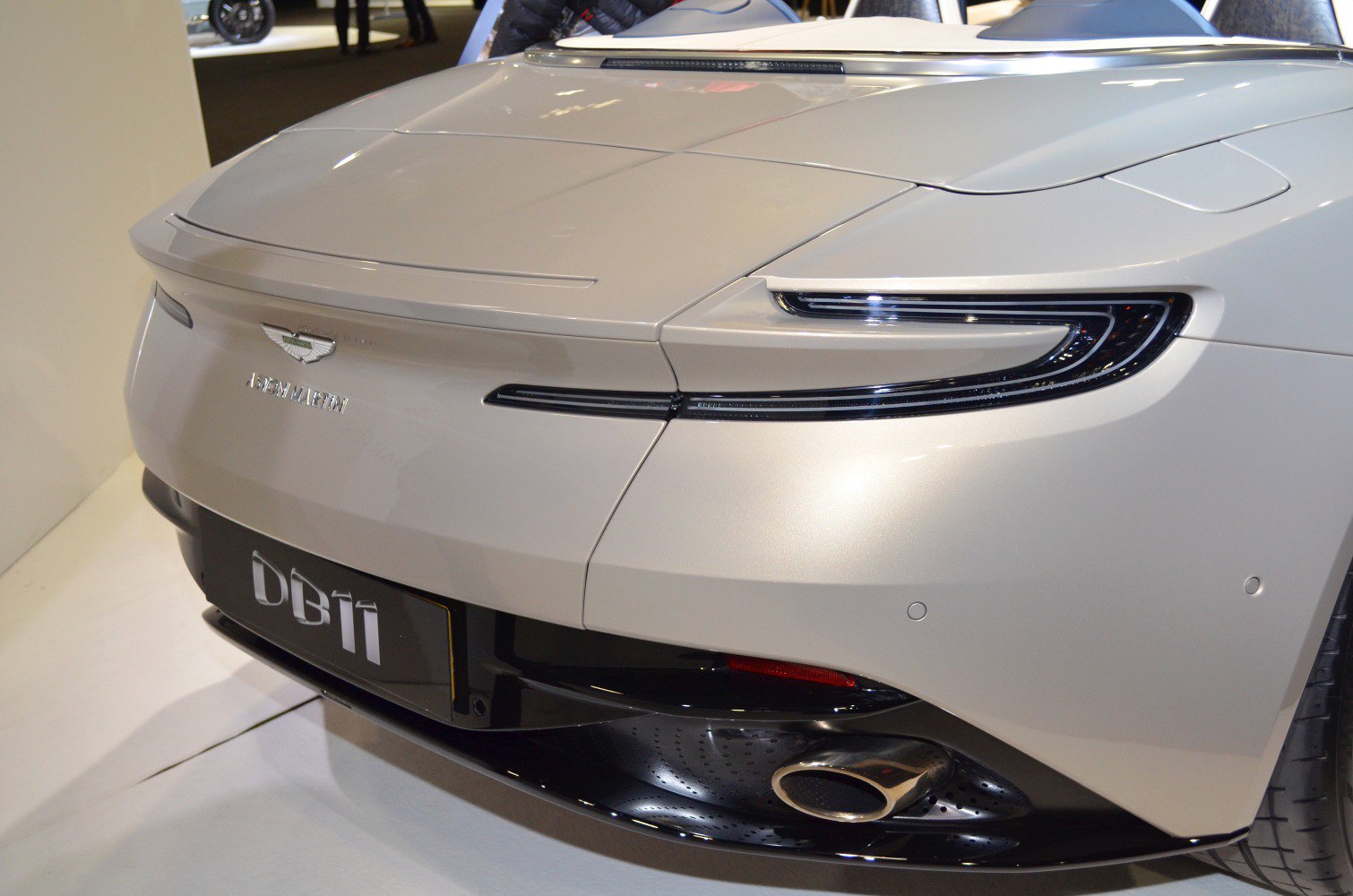 Sleek rear tail lights and exhaust of luxury sports convertible