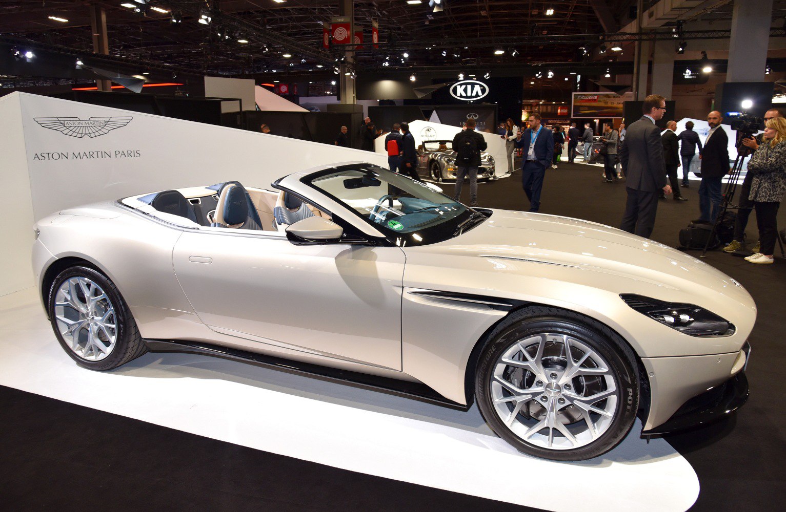 Sleek side profile of a luxury convertible with alloy wheels