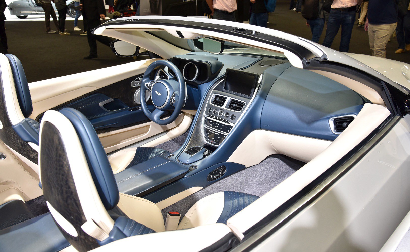 Convertible interior with two-tone blue and beige leather and advanced dashboard