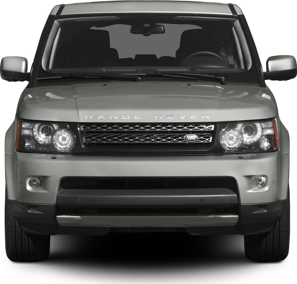 Front view with dual round headlights and mesh grille