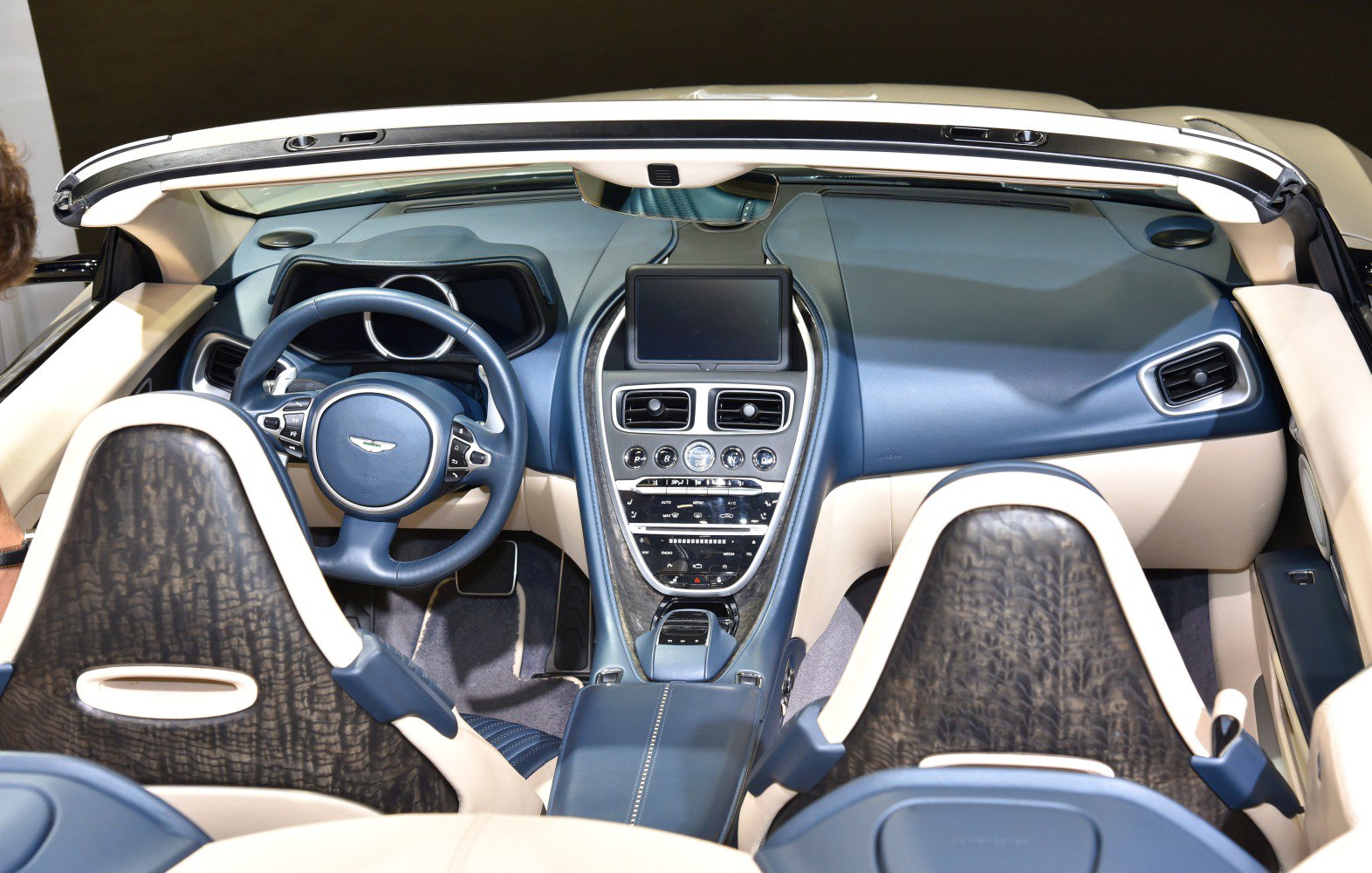 Luxurious dashboard and steering wheel with central control console.
