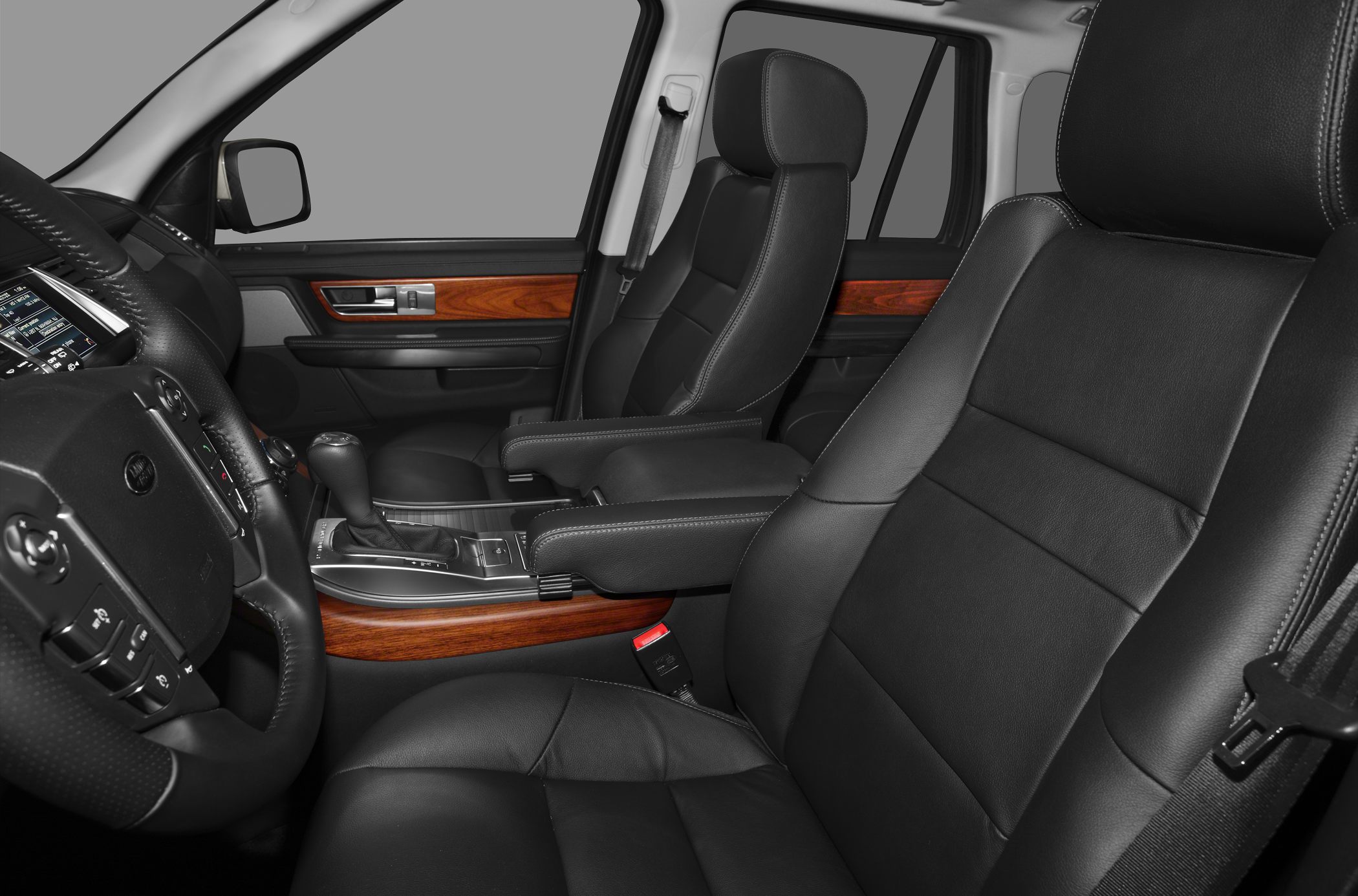 Premium leather seats with wood trim and advanced controls