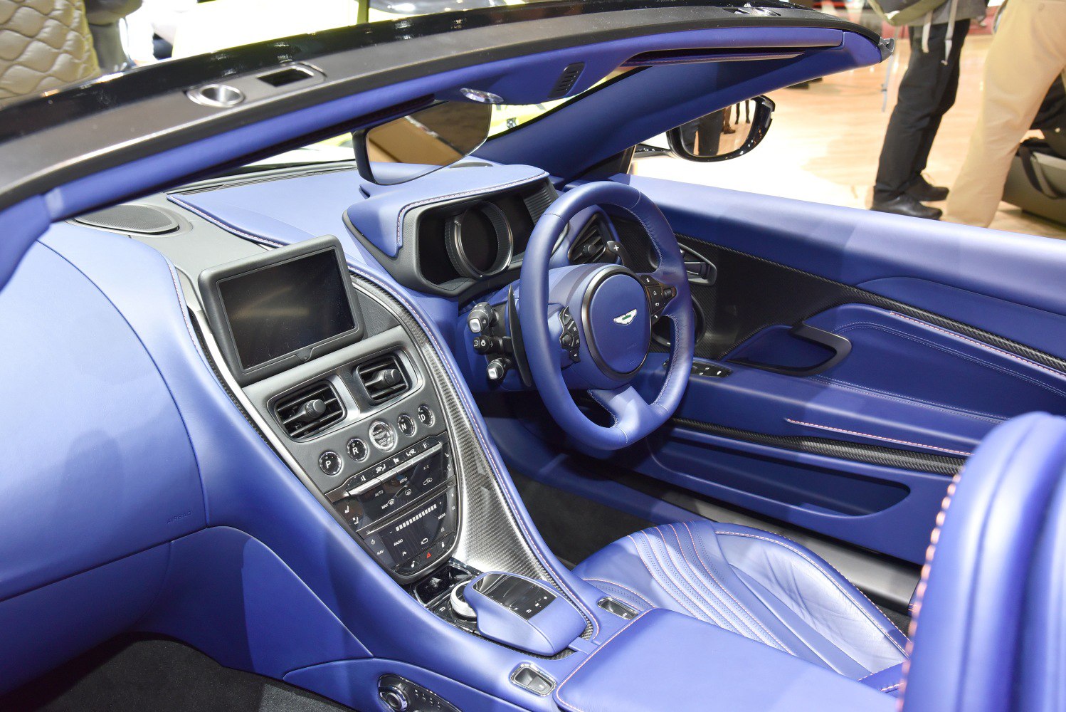 Luxurious blue leather interior with modern dashboard and center console