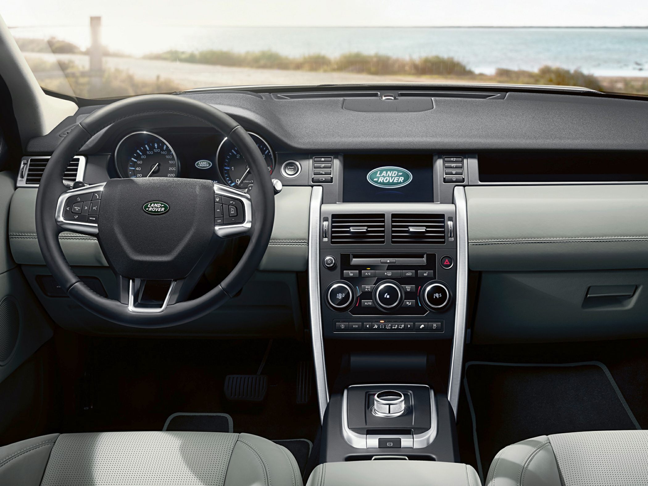 Modern SUV interior with multifunction steering wheel and advanced dashboard controls