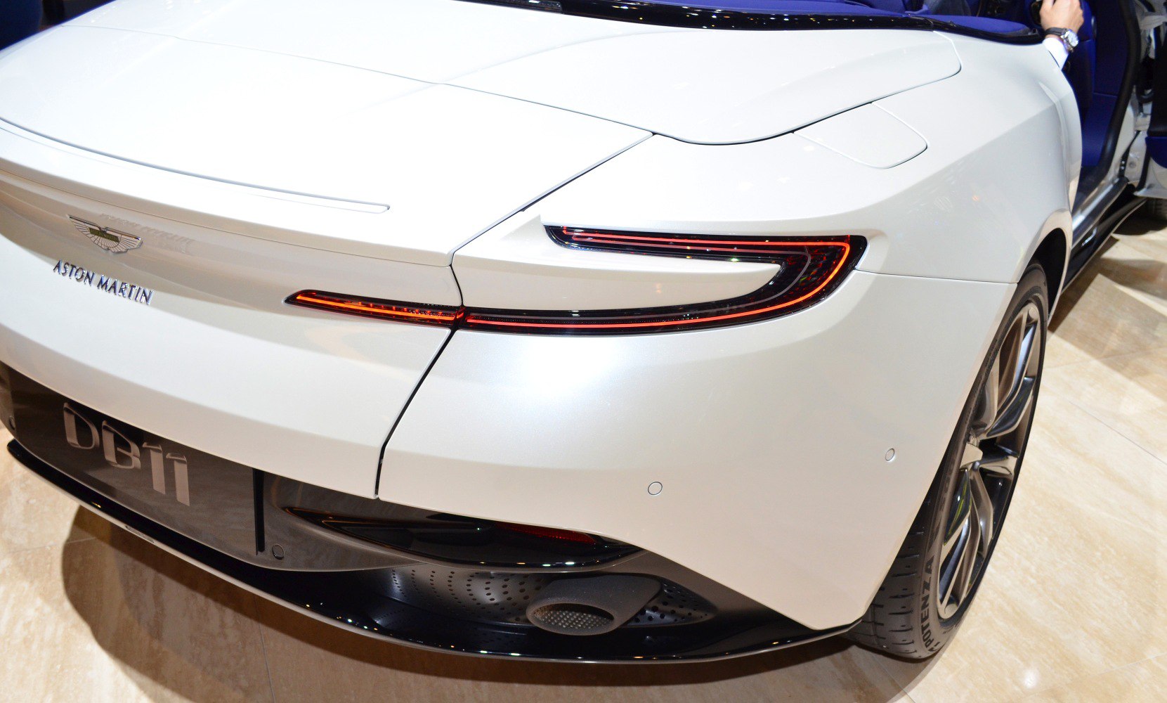 Rear design with sleek LED taillights and wheel of a luxury convertible