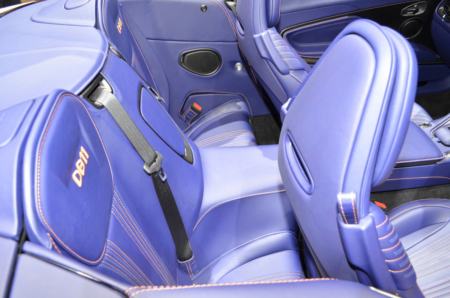 Blue leather convertible seats with contrast stitching and seat belts