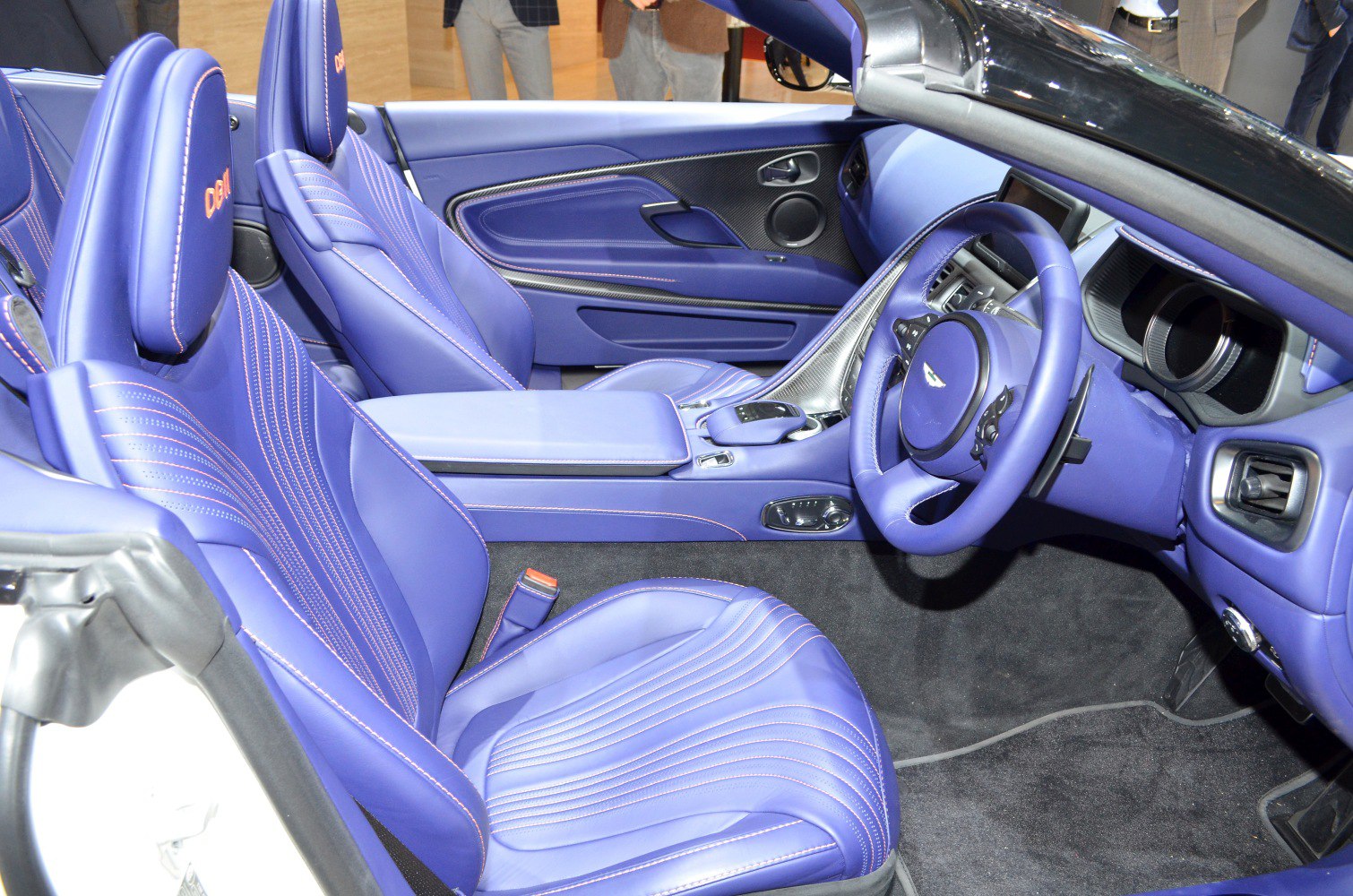 Purple leather seats with contrast stitching and carbon fiber trim