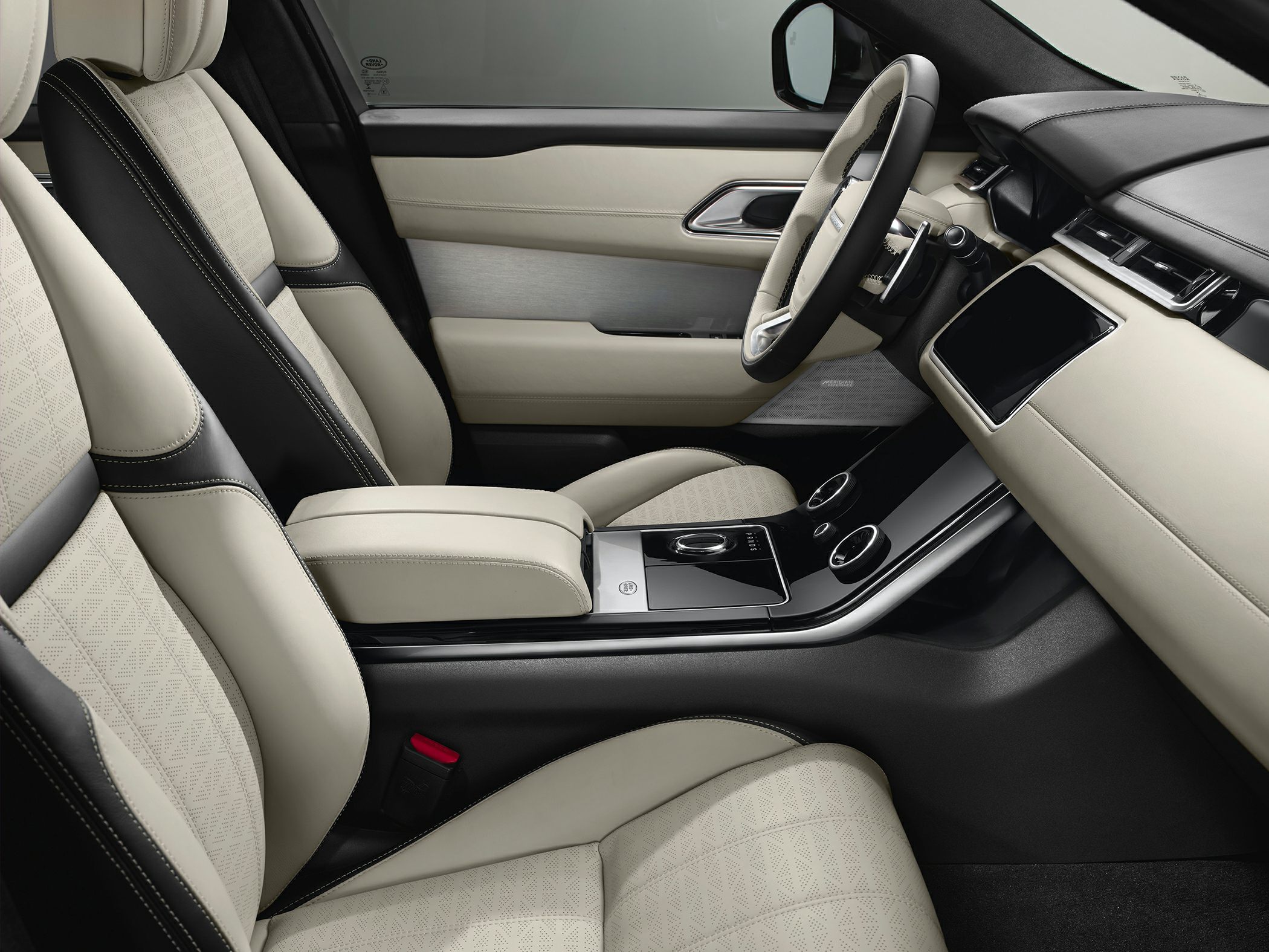 Luxury SUV interior with premium seats and advanced center console controls