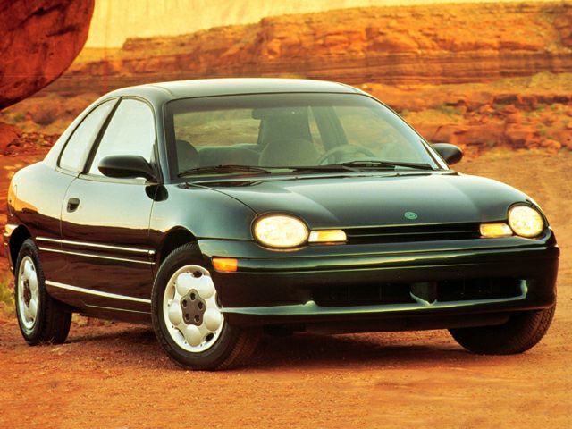 Front view of coupe with round headlights and aerodynamic design