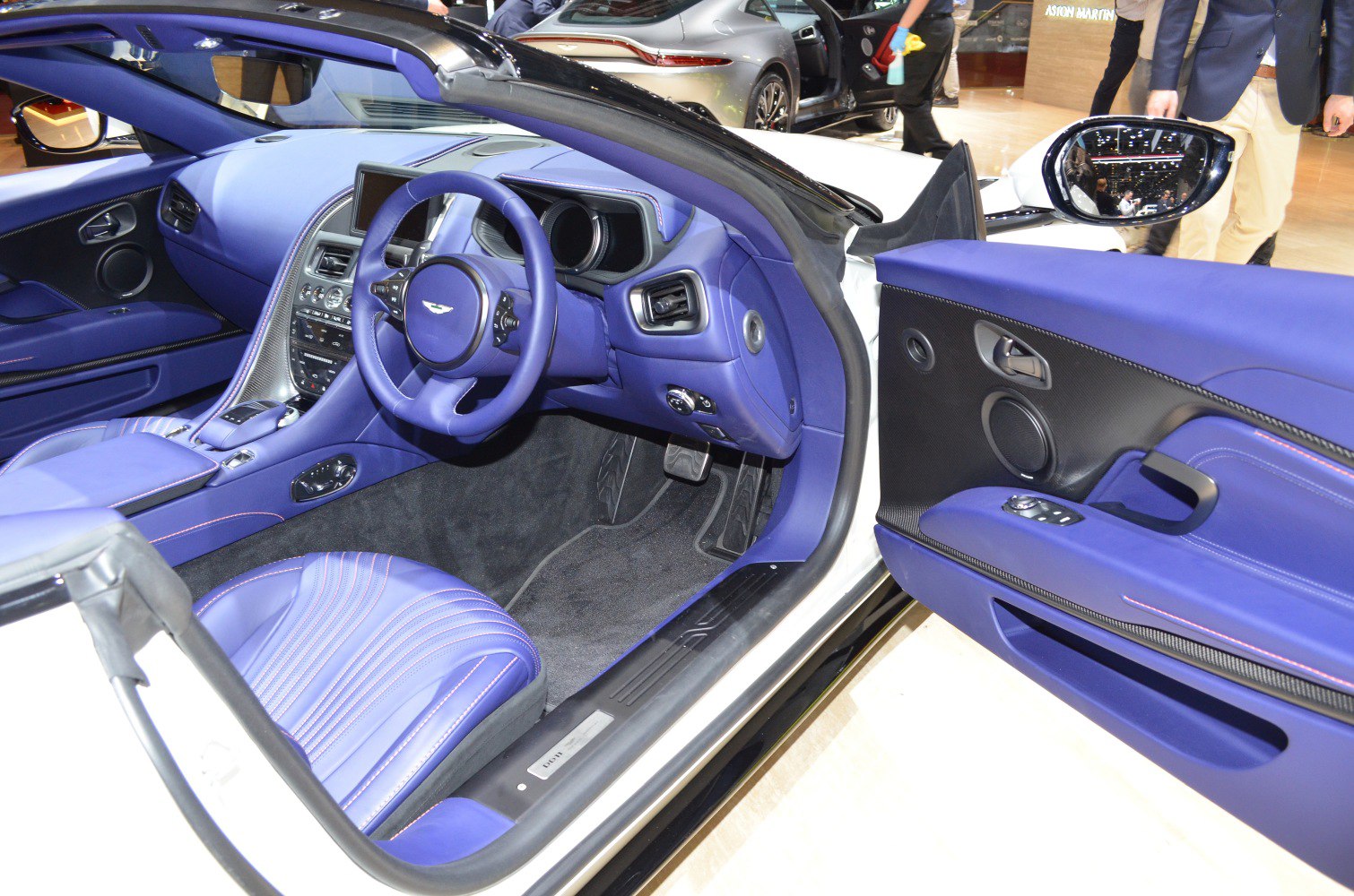 Luxurious blue leather interior with modern dashboard and steering wheel