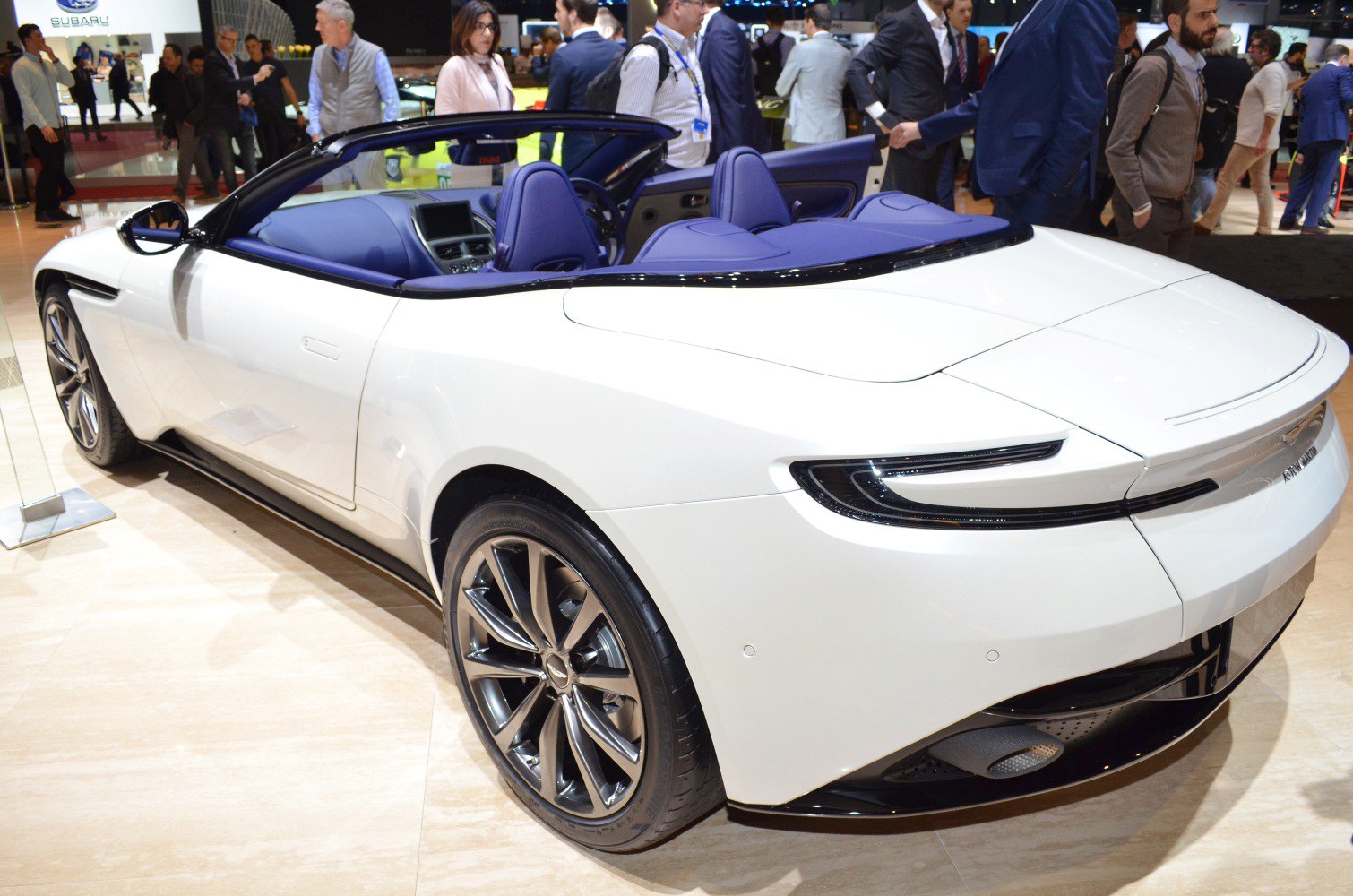 Convertible with blue interior and sleek rear taillights