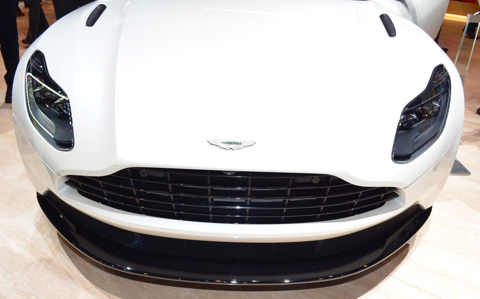 Close-up of front grille and headlights of a luxury sports car