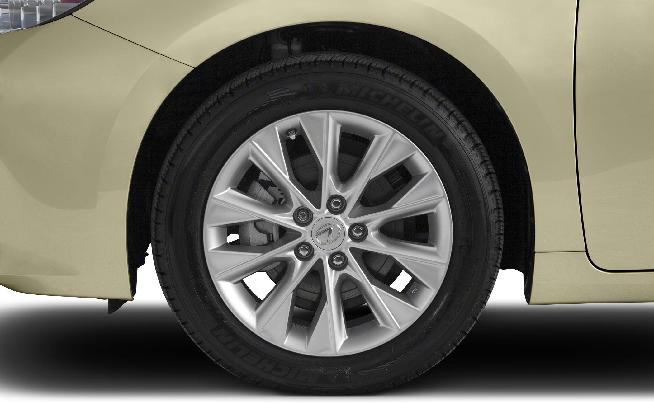Close-up of alloy wheel with Michelin tire and multi-spoke rim design