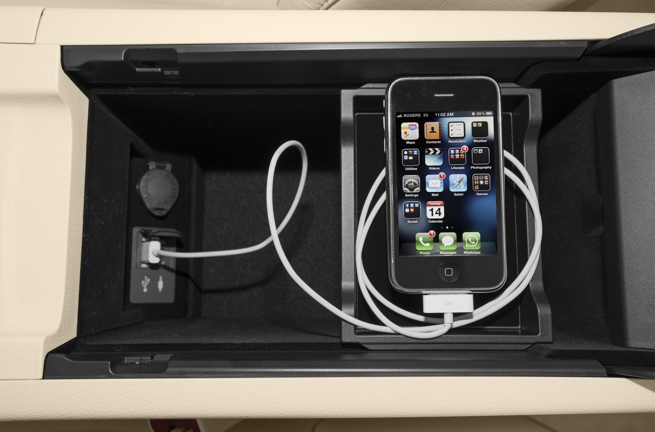 USB charging port and smartphone storage in car center console