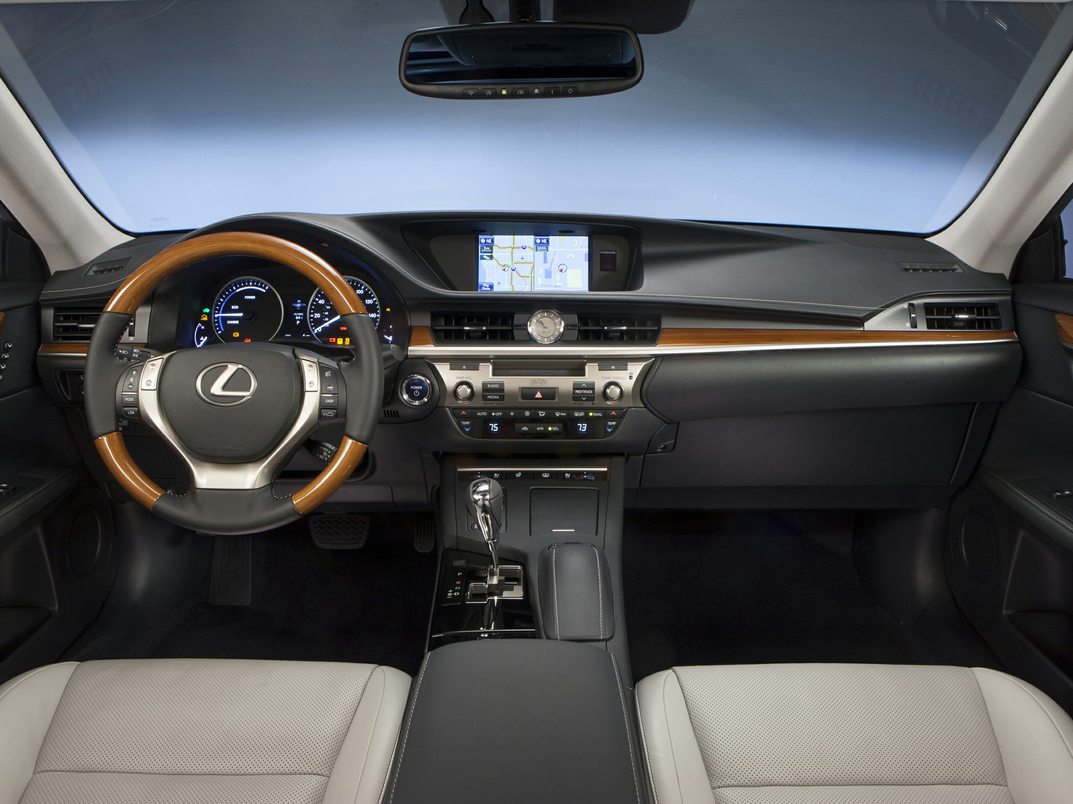 Luxury dashboard with wooden steering wheel and center touchscreen display