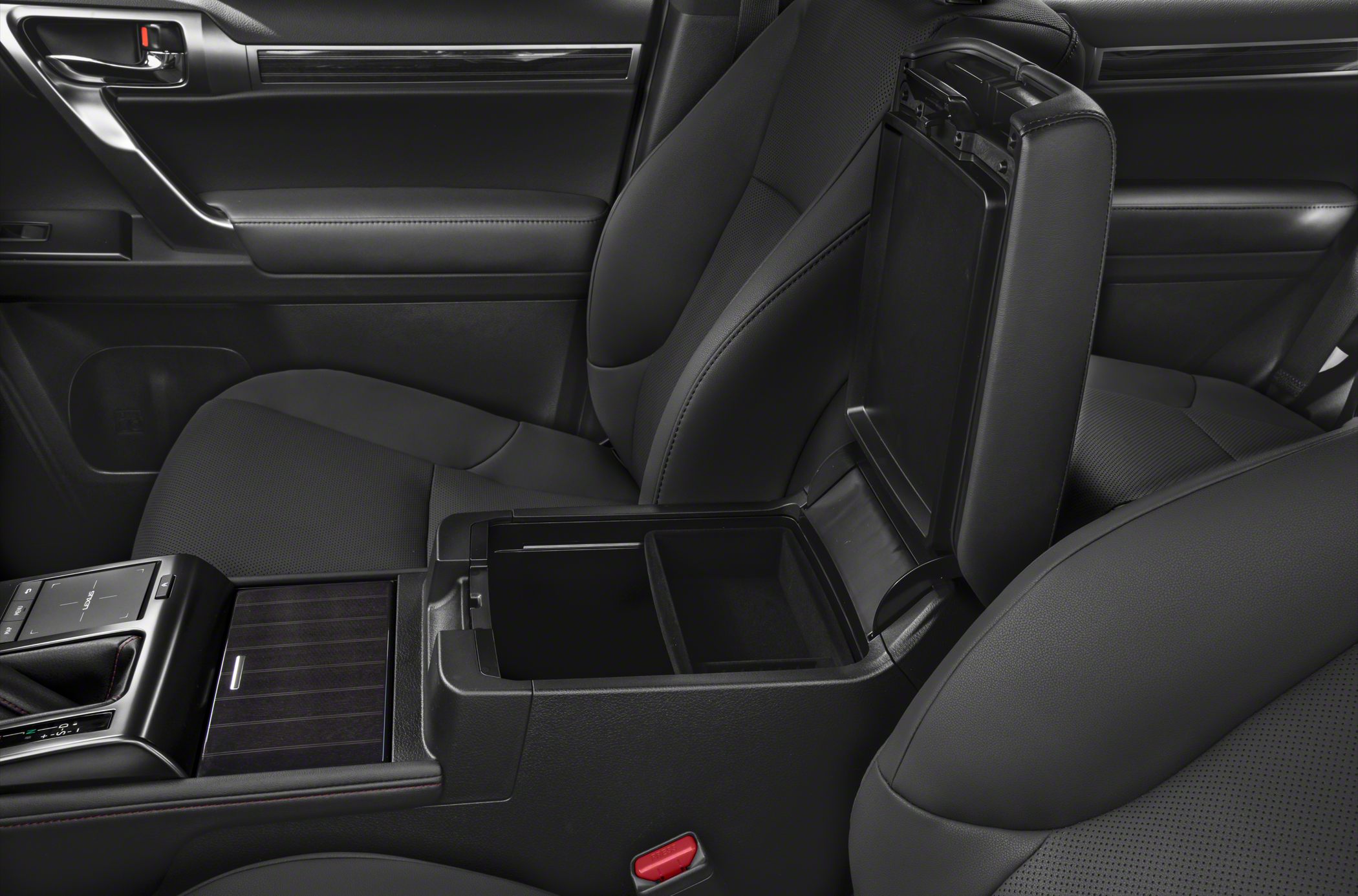 Open center console storage compartment in black leather interior
