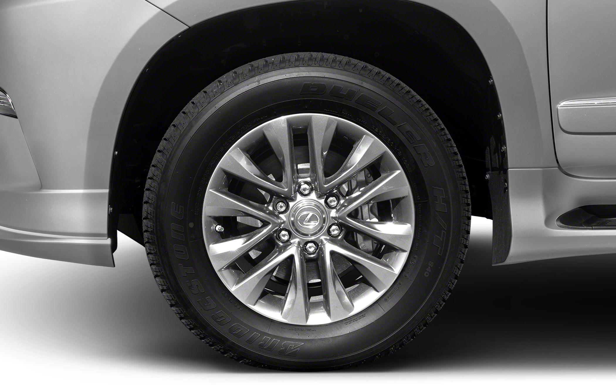 Close-up of alloy wheel and Bridgestone Dueler tire on SUV