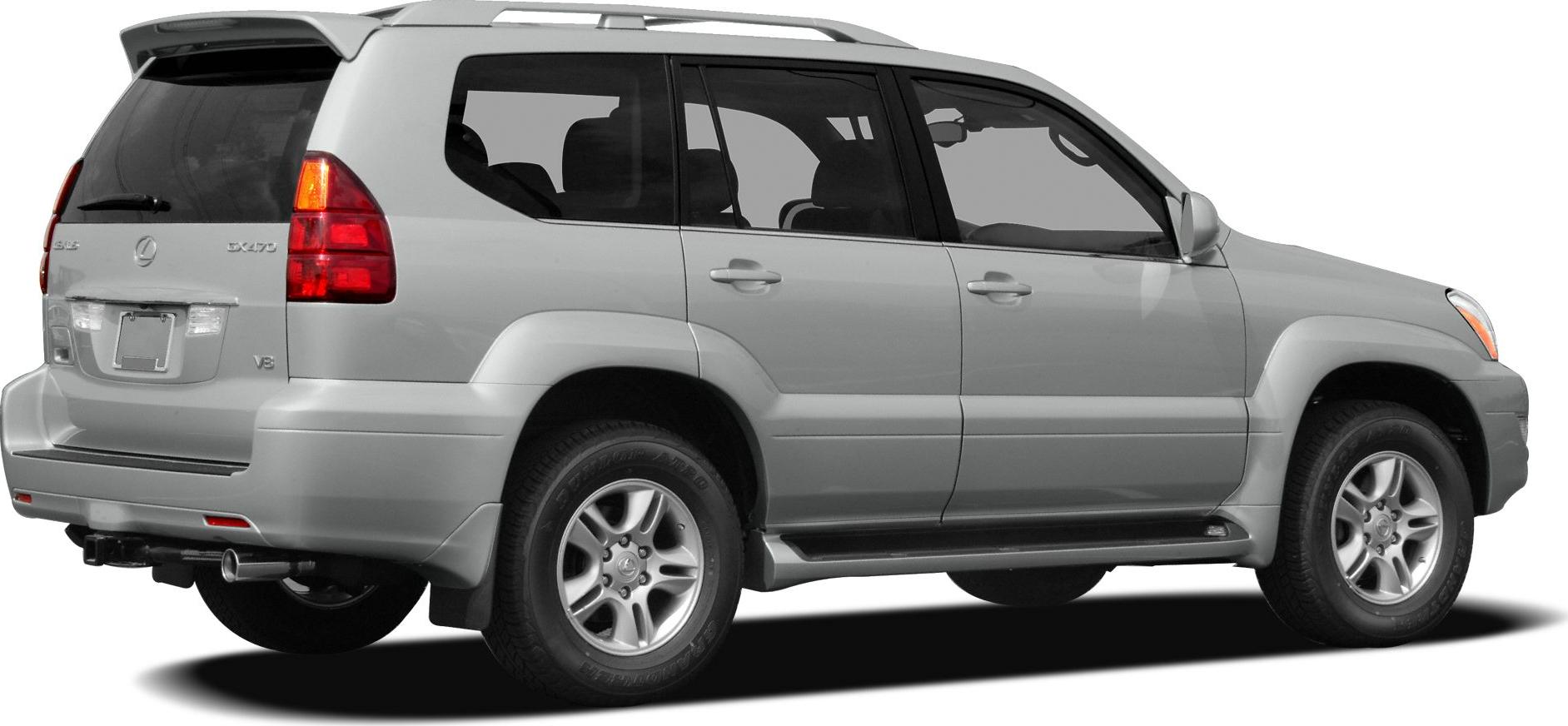 Rear-side profile of a mid-2000s luxury SUV with V8 engine badge and roof rails