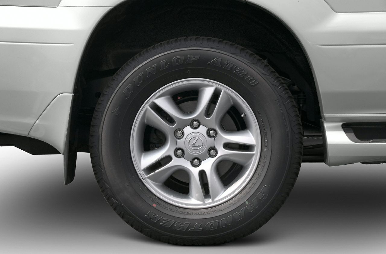Silver alloy wheel with Dunlop AT20 Grandtrek tire