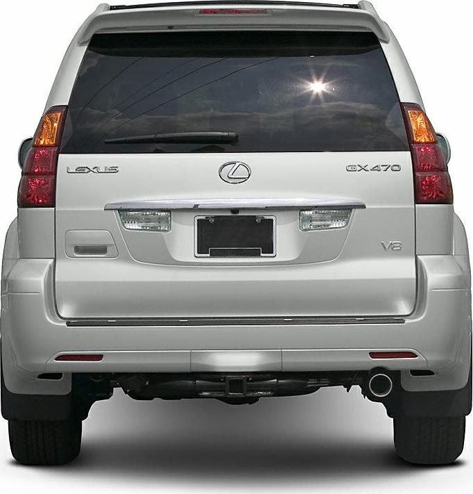 SUV rear view with taillights, rear window wiper, and exhaust pipe