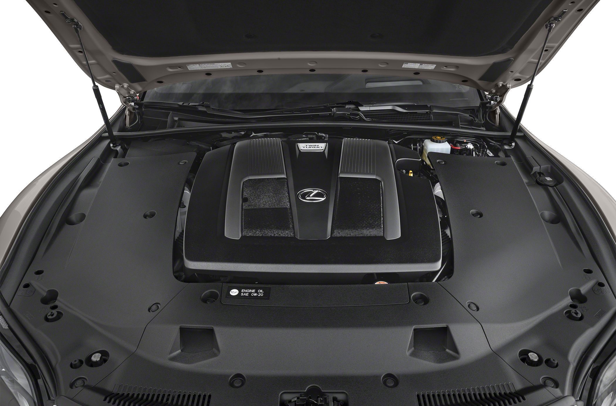 Twin-turbo V8 engine under hood with full engine bay cover