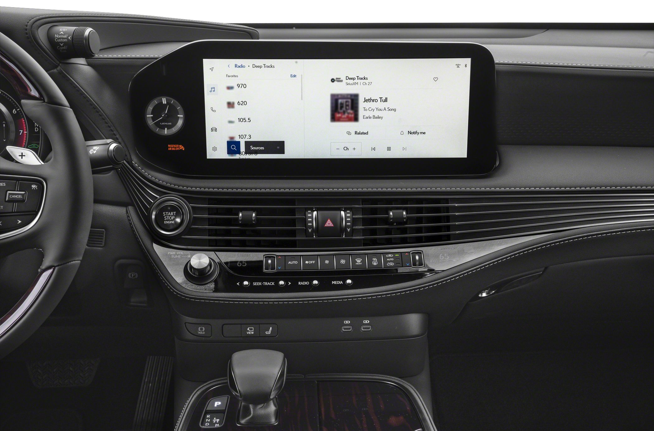 Luxury car interior with digital infotainment display and advanced controls