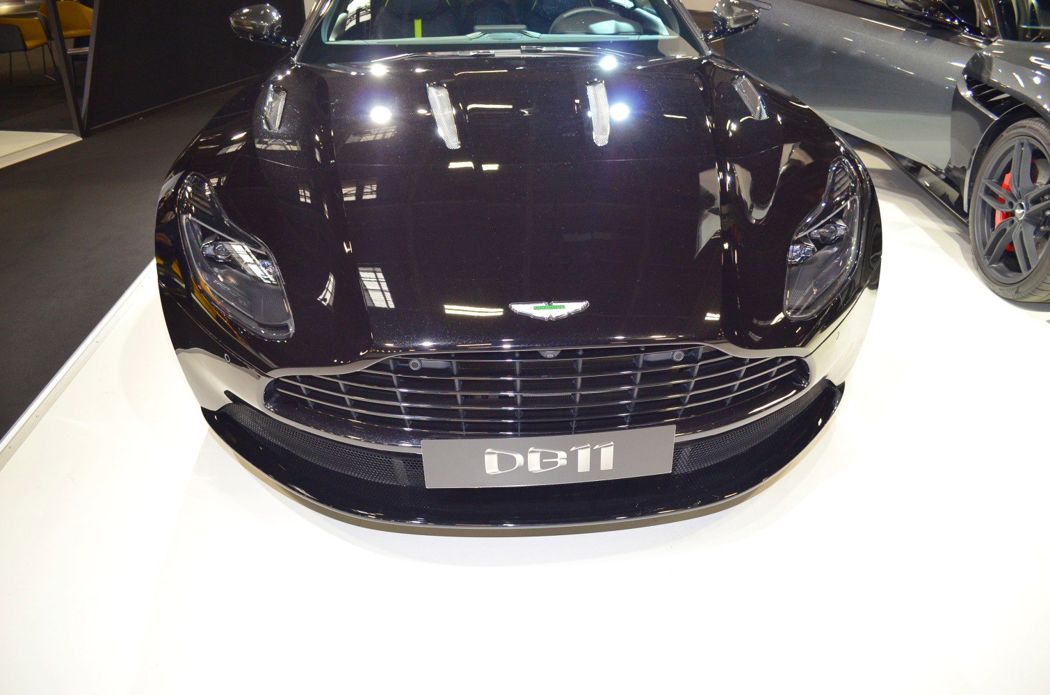 Close-up of a car's front grille and headlights