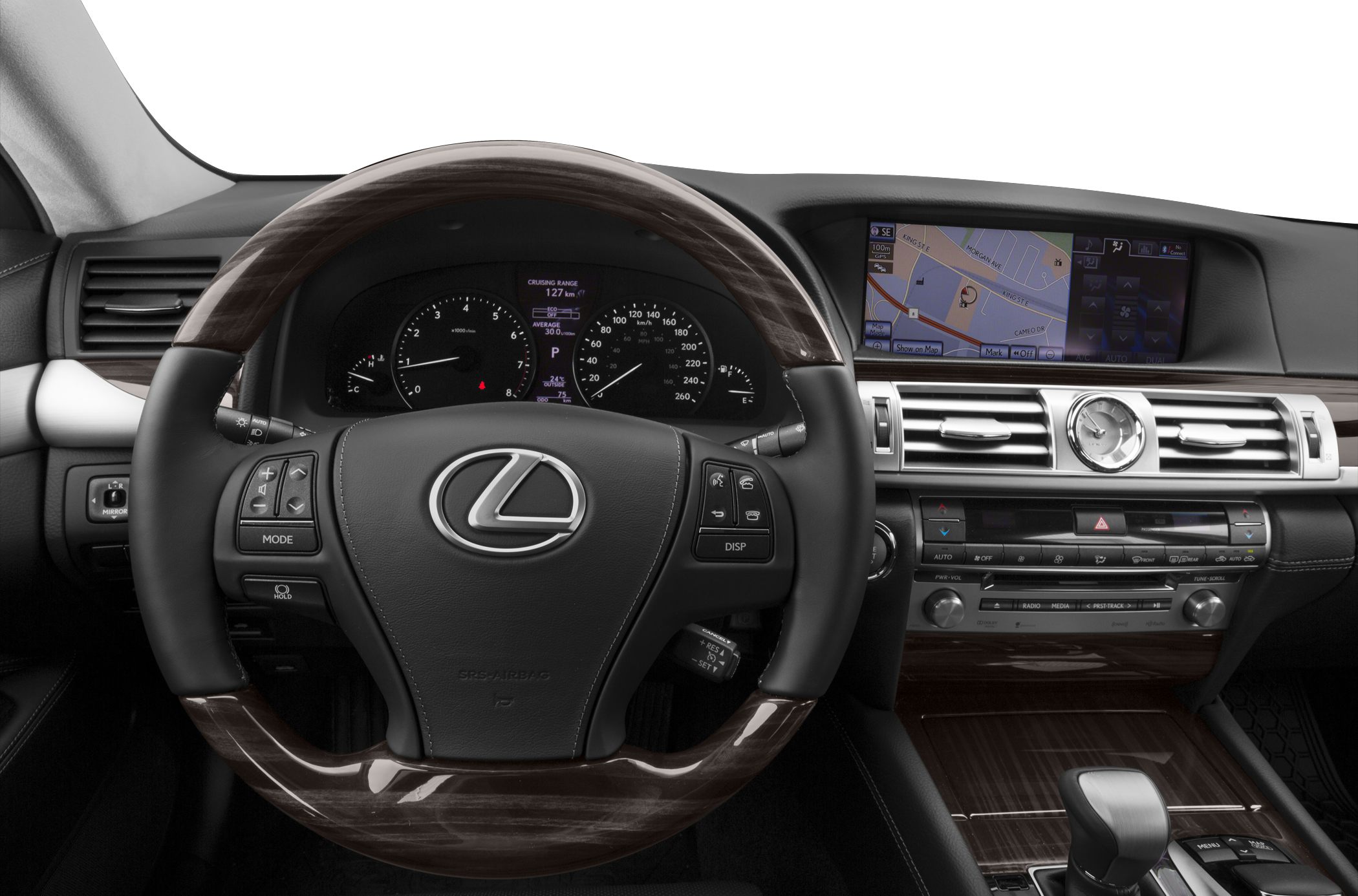Wood-trimmed steering wheel, analog clock, and navigation display on a luxury dashboard