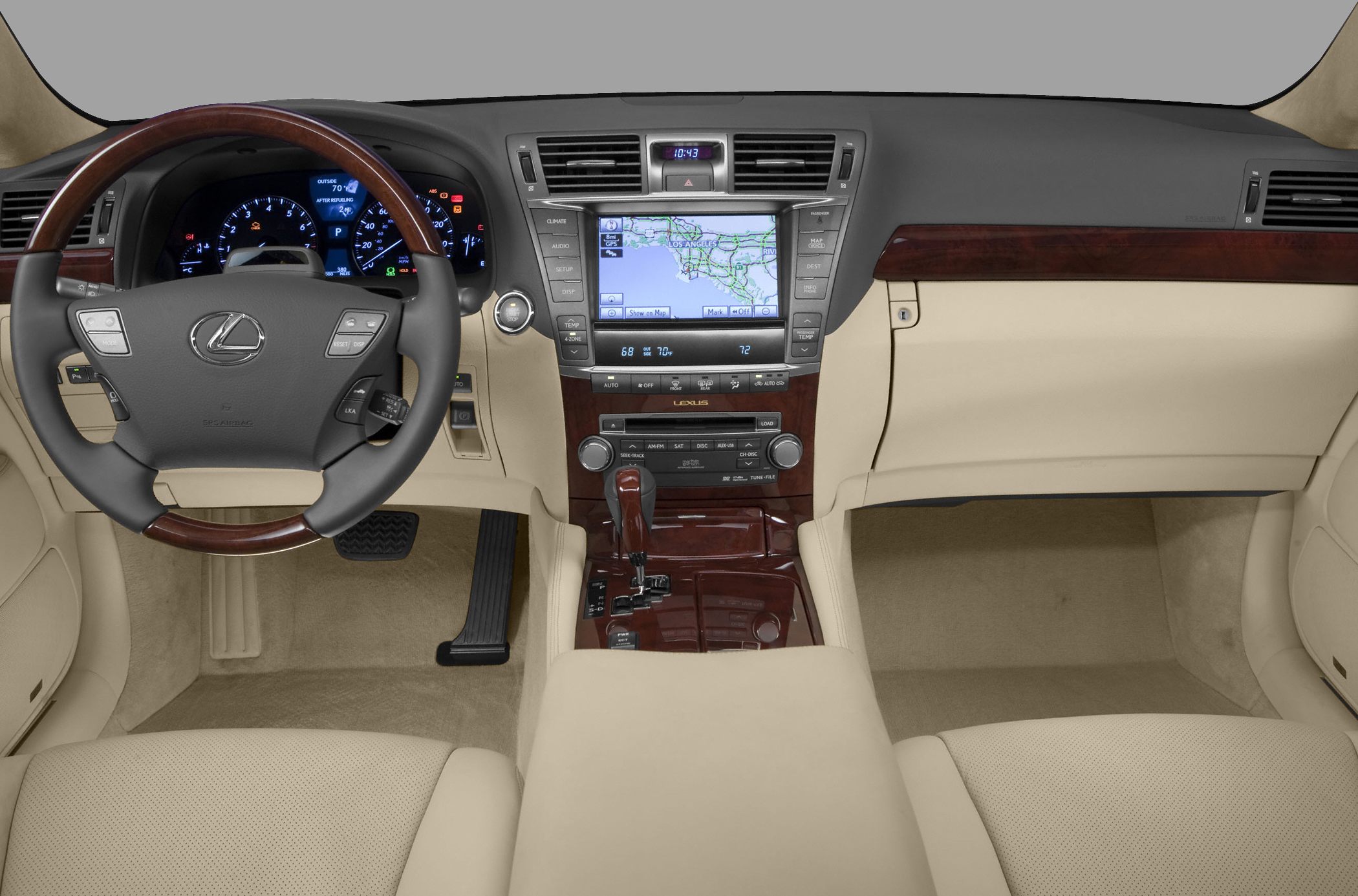 Luxury dashboard with wood-trimmed steering wheel and navigation system