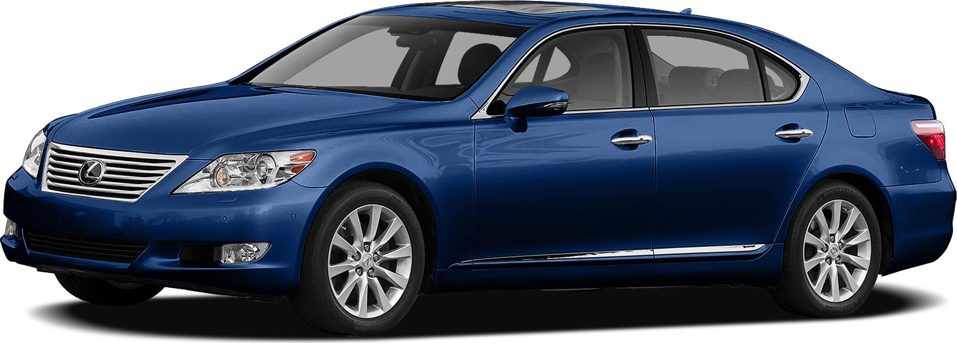 Luxury sedan with chrome trimming and multi-spoke alloy wheels in blue.