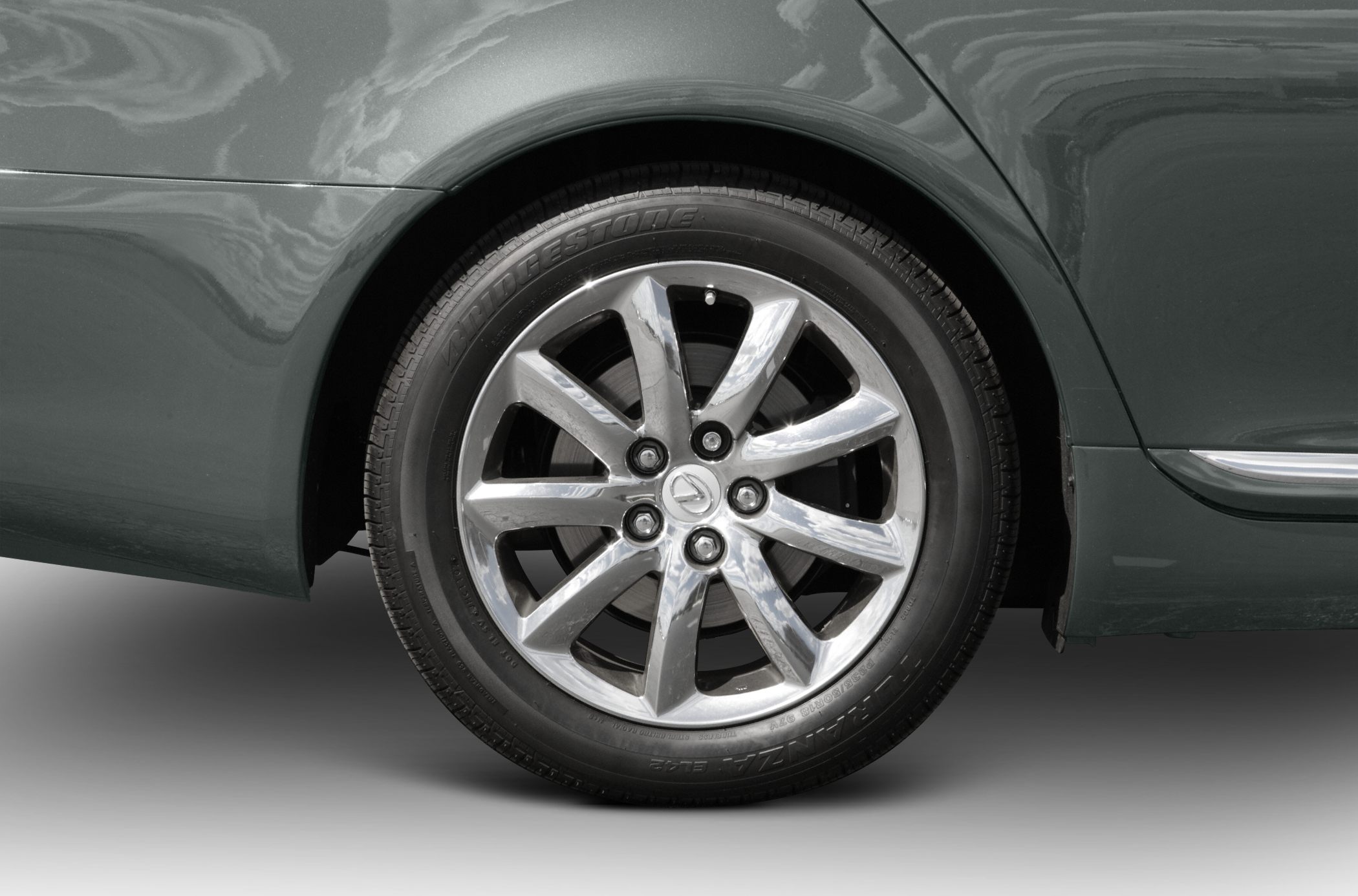Close-up of alloy wheel and tire on a car's rear side