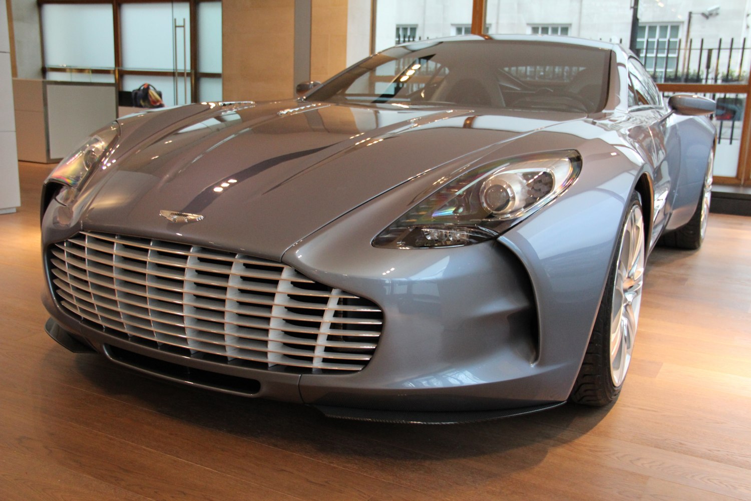 Close-up of front grille and headlight of sleek sports car