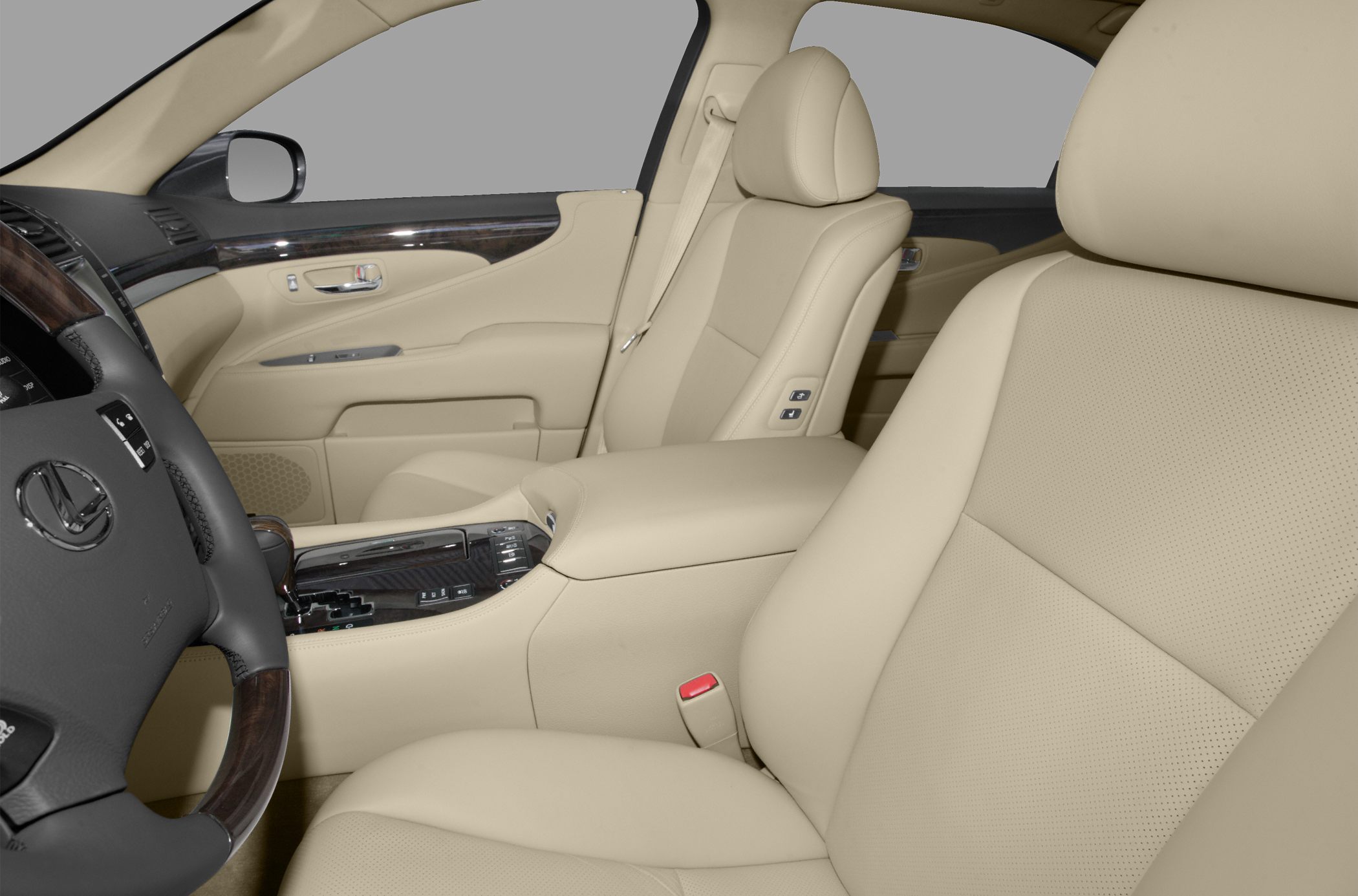 Beige leather front seats with wood trim and power seat controls