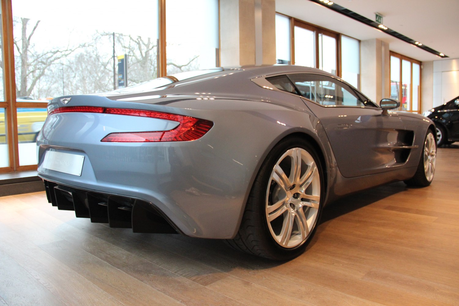 Rear and side profile highlighting aerodynamic design and alloy wheels