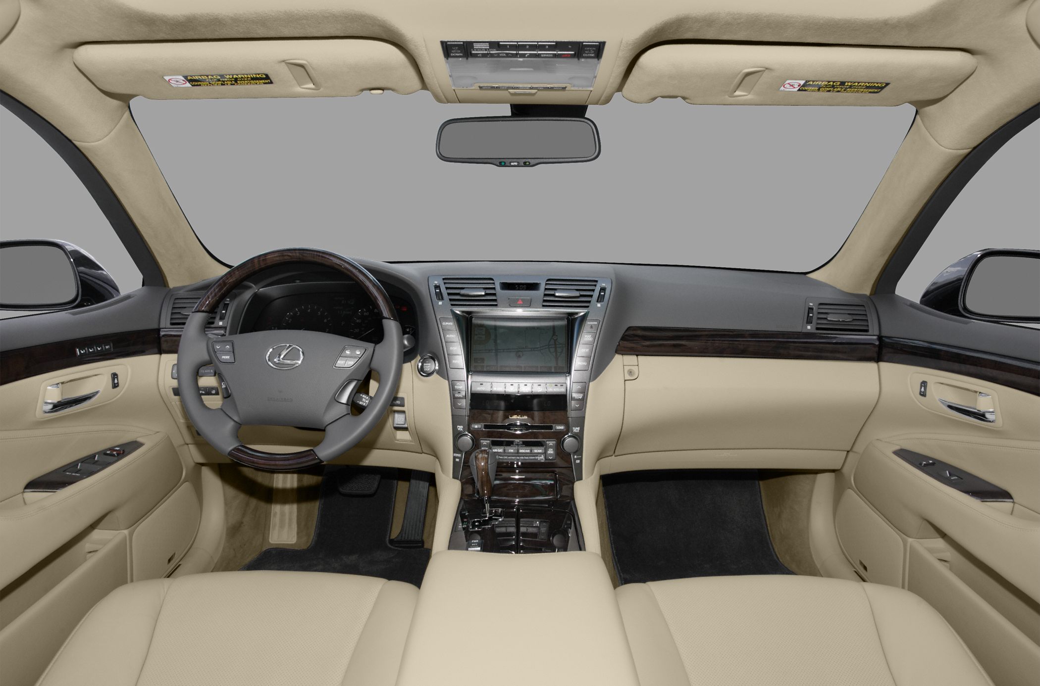 Luxury interior with beige leather seats and wood-trimmed dashboard