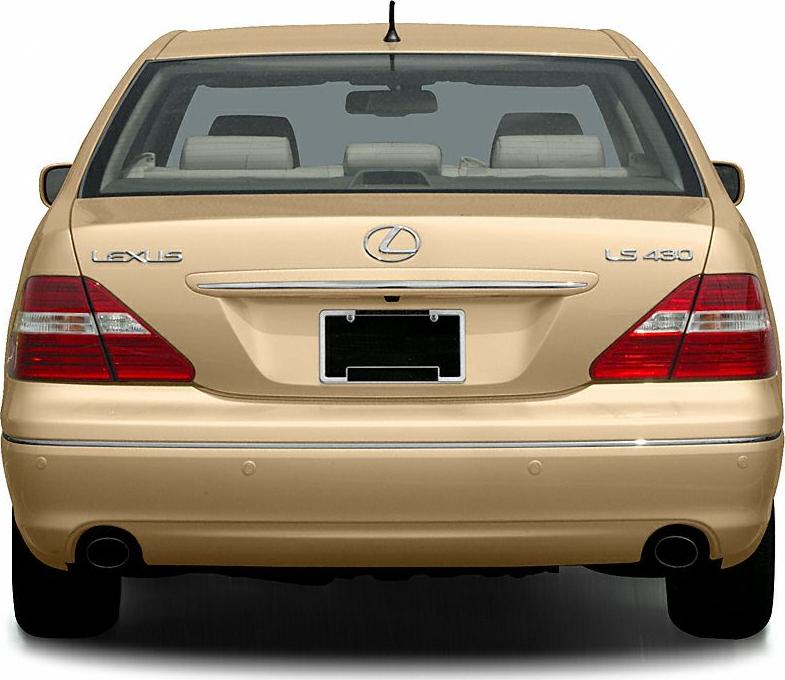 Rear view with taillights, chrome trim, and dual exhaust on luxury sedan
