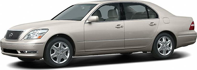 Side profile of a beige sedan with chrome wheels