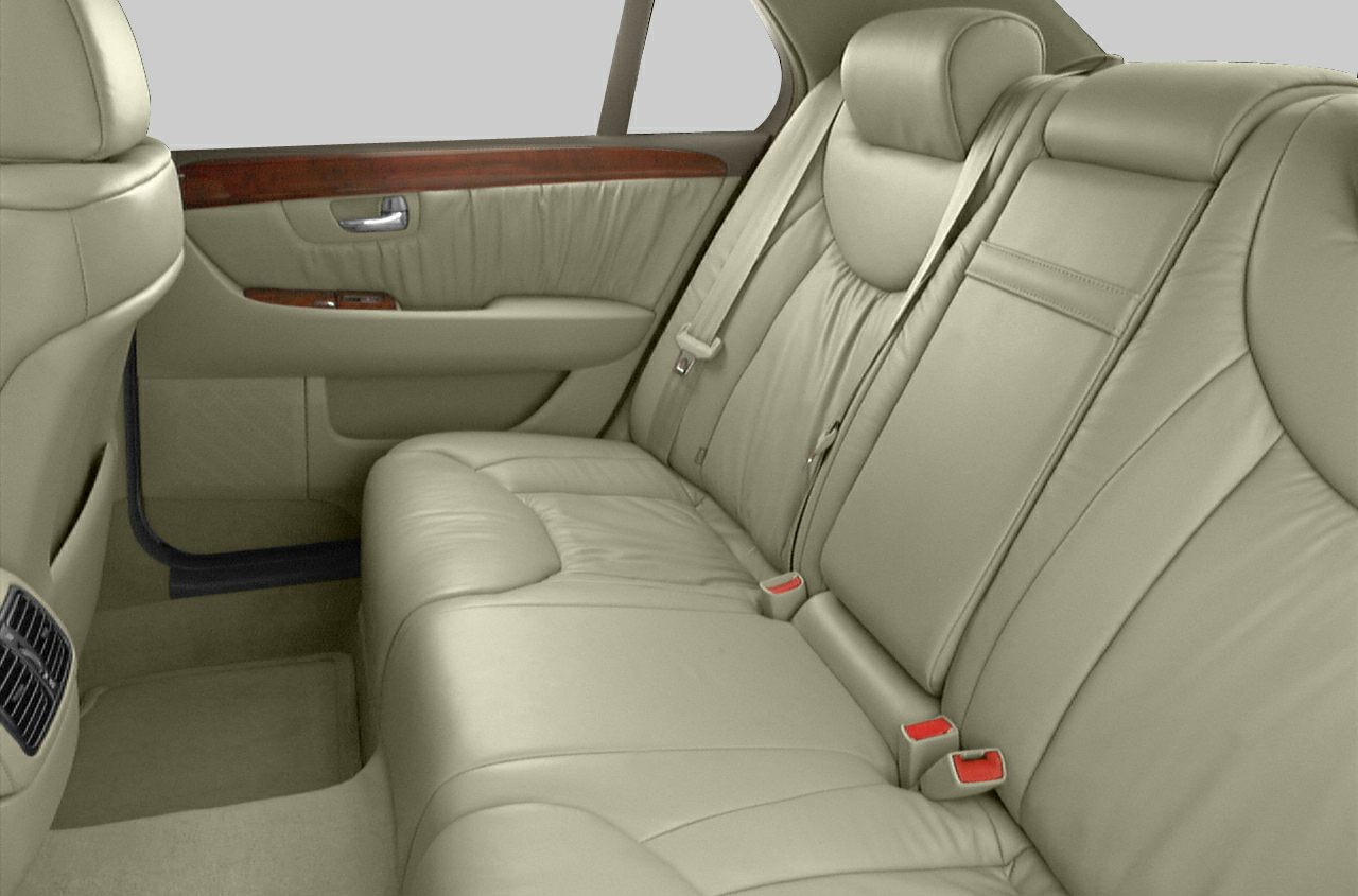 Rear leather seats and wood trim door panel