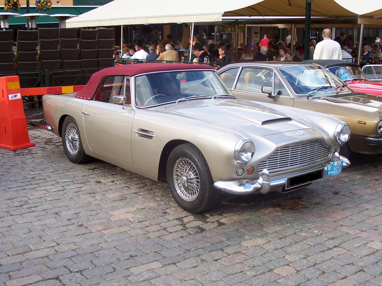 Classic convertible with wire wheels and chrome bumpers